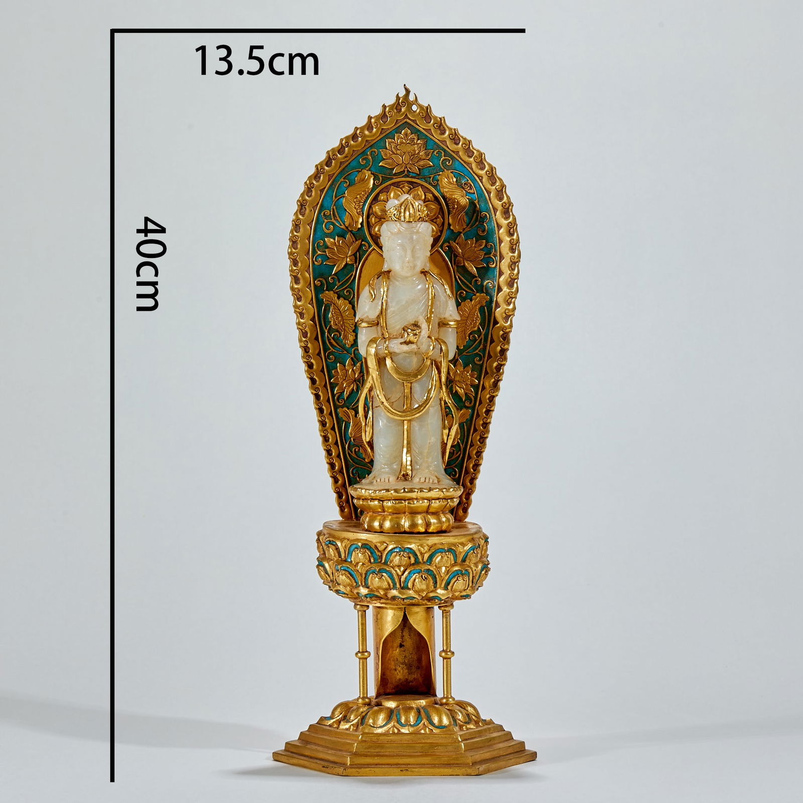 Gilt-Bronze Standing Guanyin Buddha Statue Inlaid with Jade: Gilt Bronze Standing Guanyin Statue Inlaid with Jade, height 40cm, diameter 13.5cm, with Buddha's body made of Hetian white jade, gilt bronze mandorla and base, decorated with cloisonné enamel. Guany