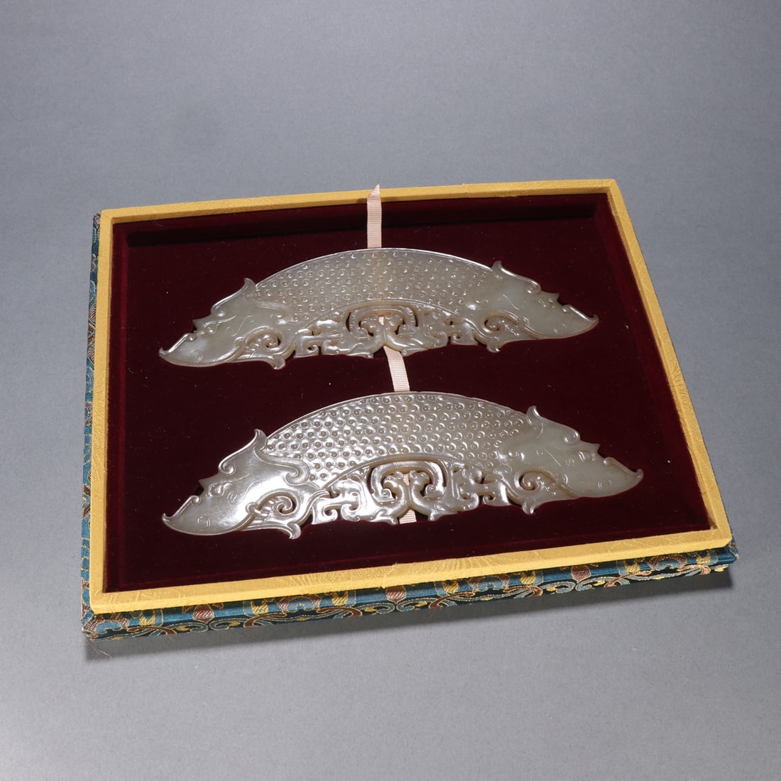 A Pair of Hetian Jade Huang (Pendant) with Double Dragon and Double Phoenix Motifs (1 of 9)