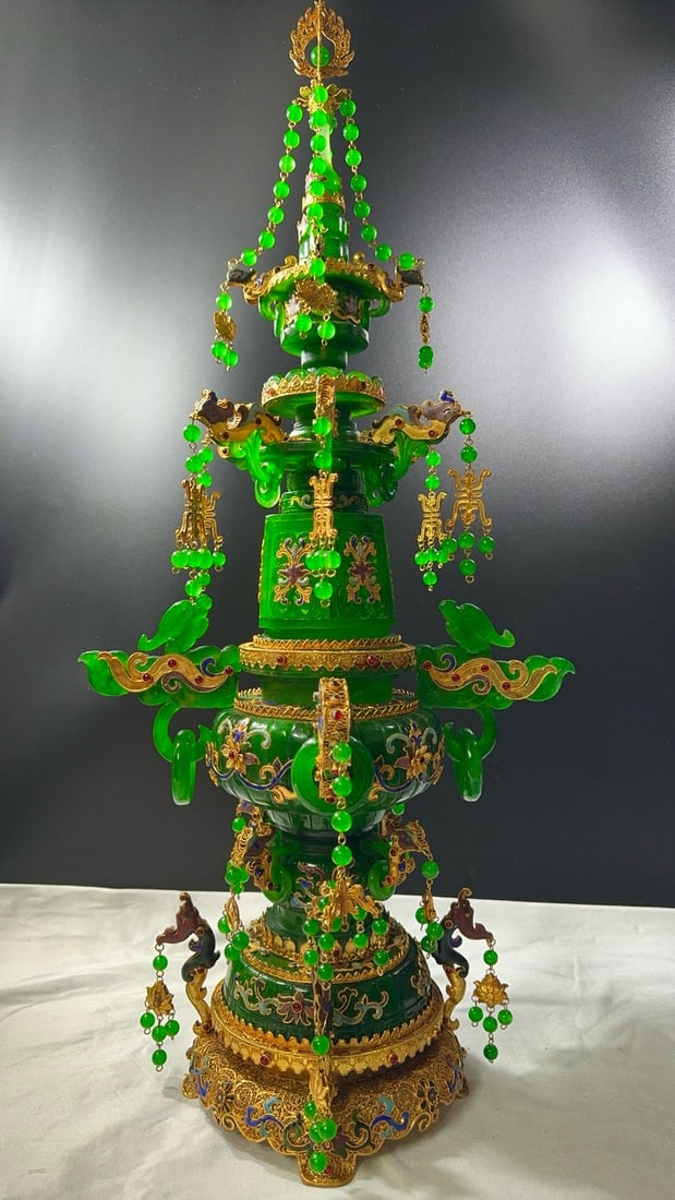 Gilt Filigree Dragon-Ear Pagoda Incense Burner Inlaid with High-Transparency Jadeite: Gilt Filigree Dragon-Handled Pagoda Censer Inlaid with High Ice Jadeite, height 73cm, width 35cm, thickness 30cm, high ice jadeite with silver gilt filigree and inlaid gemstones. Adopting "filigree" a