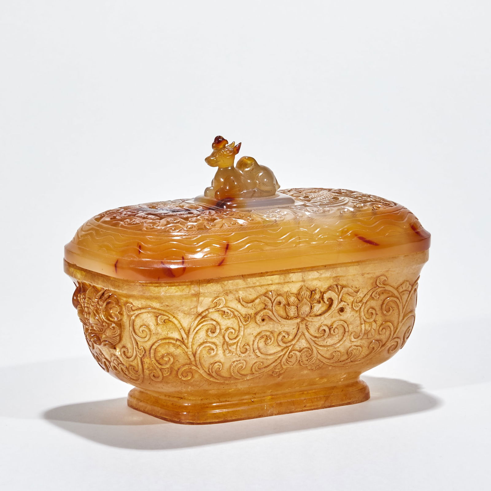 Agate Incense Burner with Flower and Auspicious Beast Motifs: Agate Flower and Auspicious Beast Incense Burner, height 13.5cm, length 17cm, width 10cm, natural agate. Using round carving and openwork techniques, the body of the incense burner is decorated with
