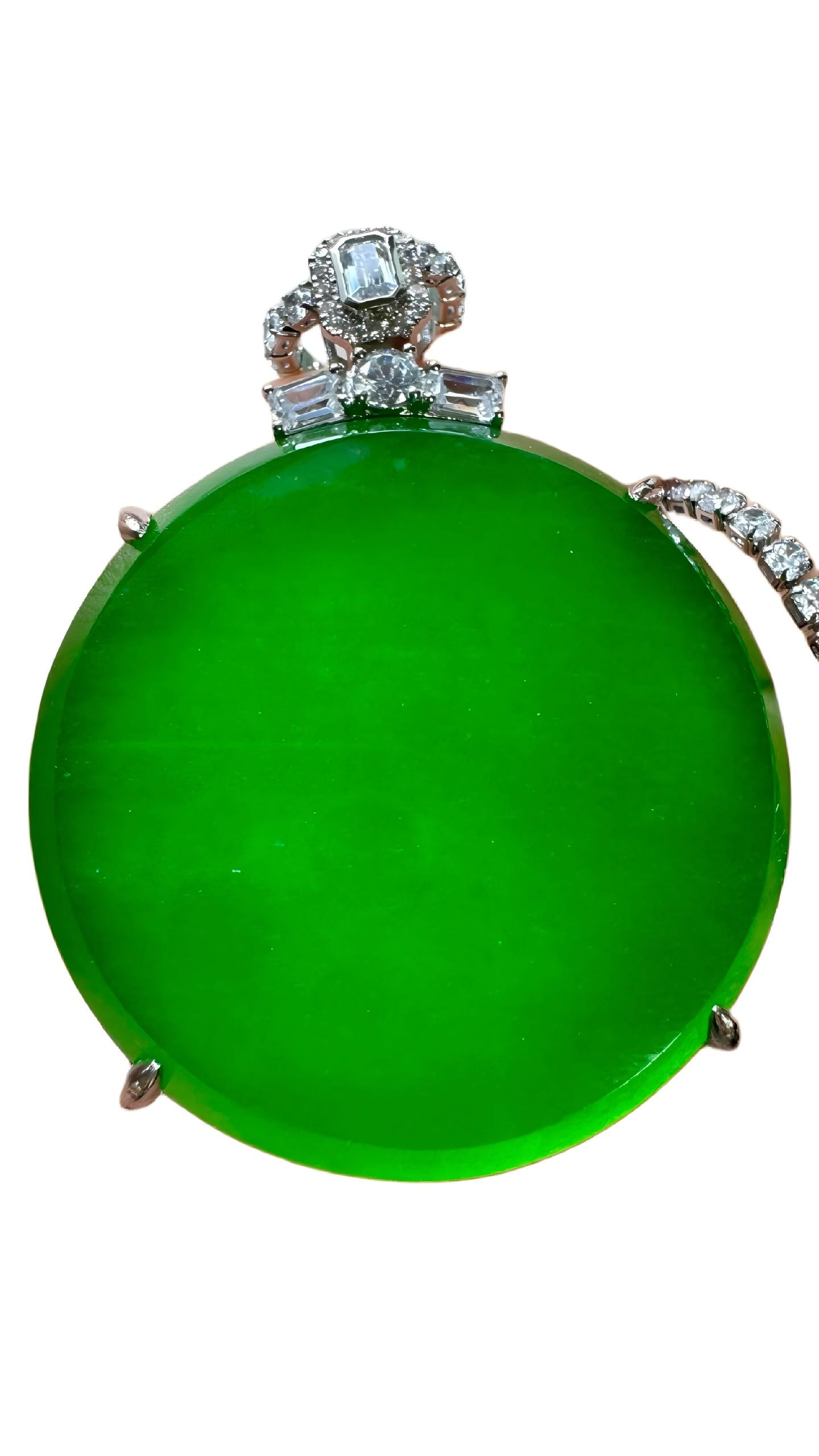 Pure Silver Plaque Inlaid with Jadeite (Peace and Safety Plaque): Pure Silver Inlaid Jadeite Peace Pendant, diameter 5.3cm, weight 83g, high ice imperial green jadeite inlaid with diamonds in pure silver. The jadeite is naturally formed with a rich color and