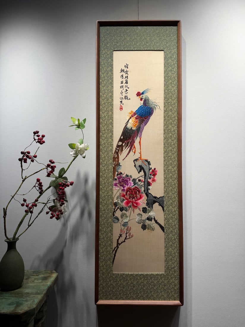 Hunan Embroidery Single Phoenix Facing the Sun , Republic of China Period: Republic of China Hunan Embroidery Single Phoenix Facing the Sun , length 122cm, width 37cm, plain satin ground, silk threads (velvet threads), modern mounting. Adopting Hunan embroidery techniques of