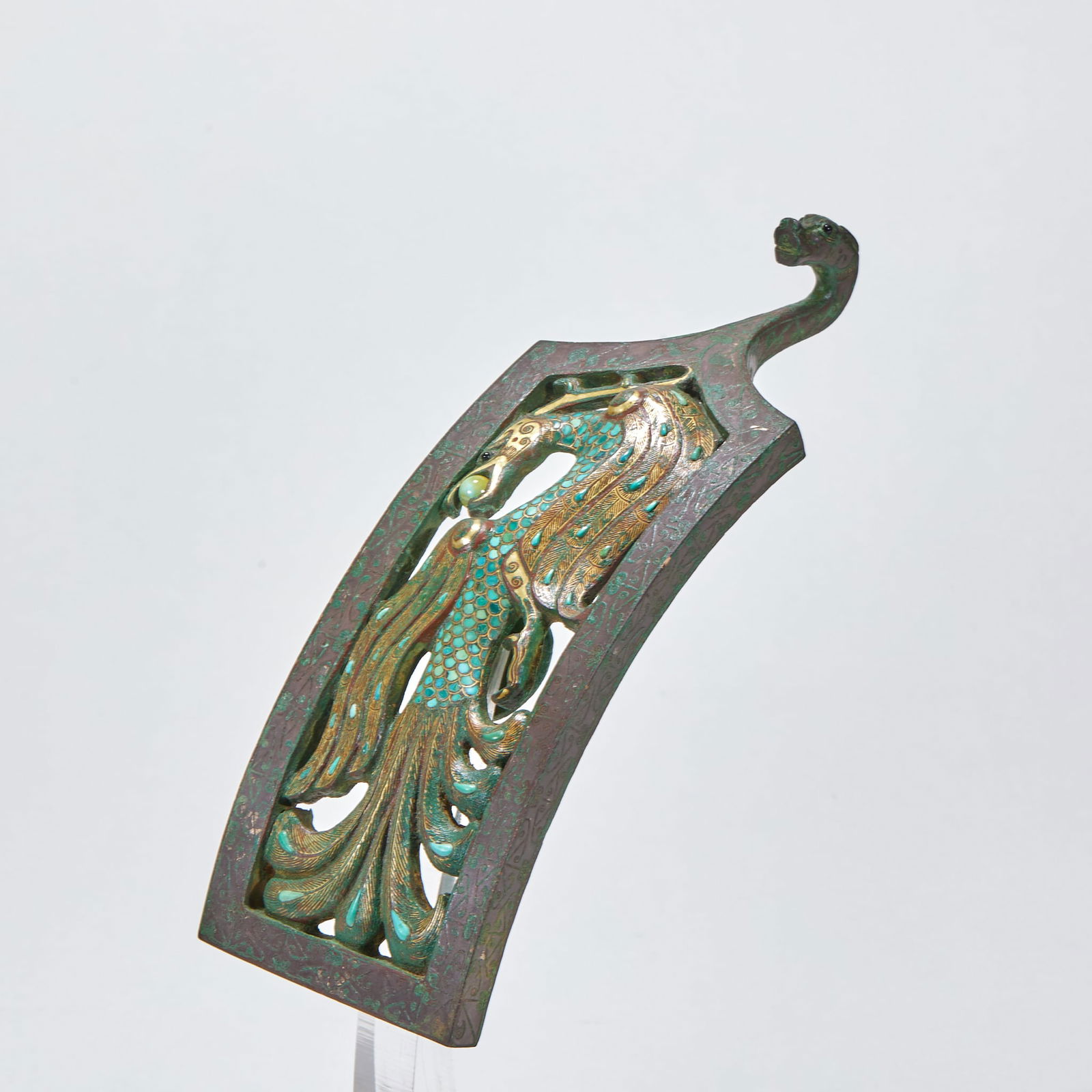 Gold and Silver Inlaid Turquoise-Adorned Bronze Phoenix-Patterned Belt Hook, Warring States to Han: Warring States to Han Period Gold and Silver Inlaid Turquoise Bronze Phoenix Pattern Belt Hook, length 20.5cm, width 7.5cm, weight 660g, bronze with gold and silver inlay, inlaid with turquoise. The b