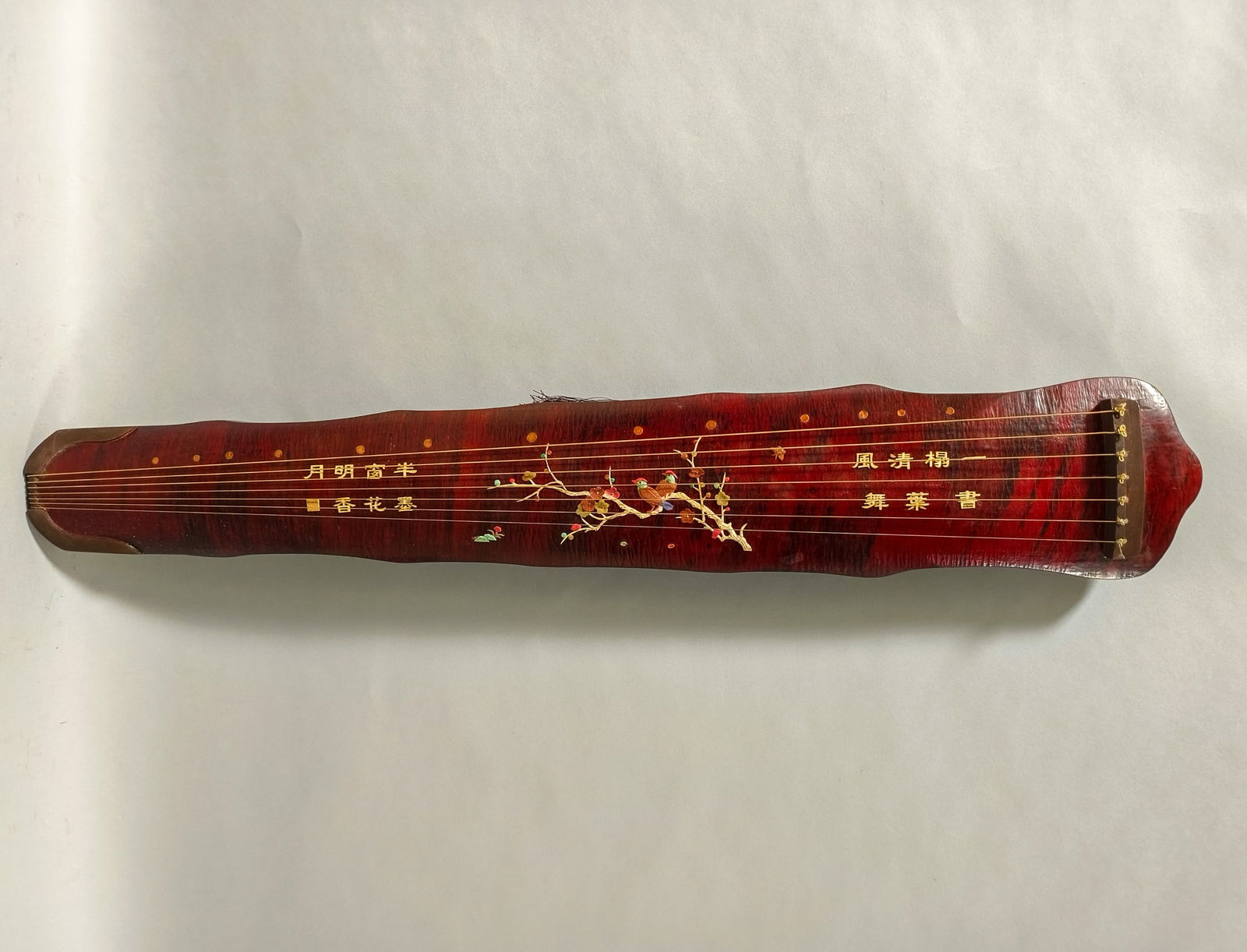 Lacquered Wooden-Bodied Guqin Inlaid with "Magpies on Plum Blossoms" Motif and Inscribed Poems (1 of 8)