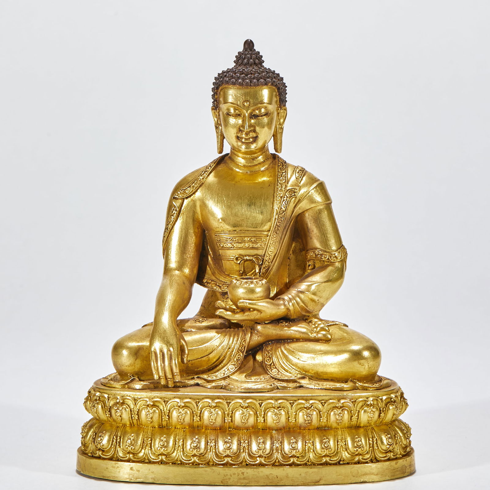 Gilt-Bronze Statue of Bhaisajyaguru (Medicine Buddha): Gilt Bronze Medicine Buddha Statue, height 15cm, length 12cm, width 8cm, weight 801g