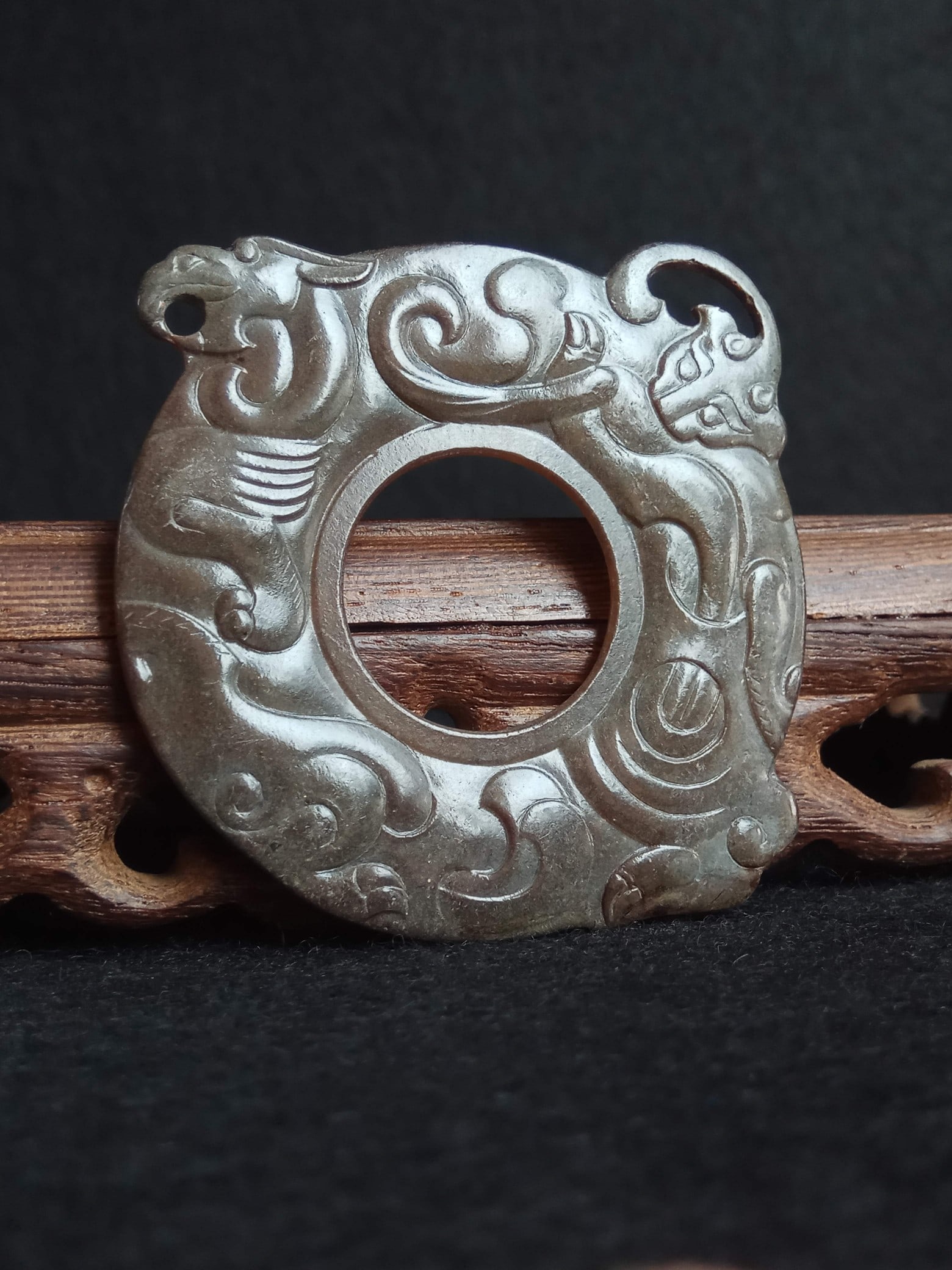 Archaic Hetian Jade Pendant (Huan/Bi-shaped) with Dragon and Phoenix Pattern, Han Dynasty (Warring: Thickness 0.3cm, Length 5.4cm, Width 5.4cm, Weight 14g, Unearthed from noble tombs of the Warring States and Han Dynasties, similar artifacts are mostly found in high-grade tombs such as the King Chu