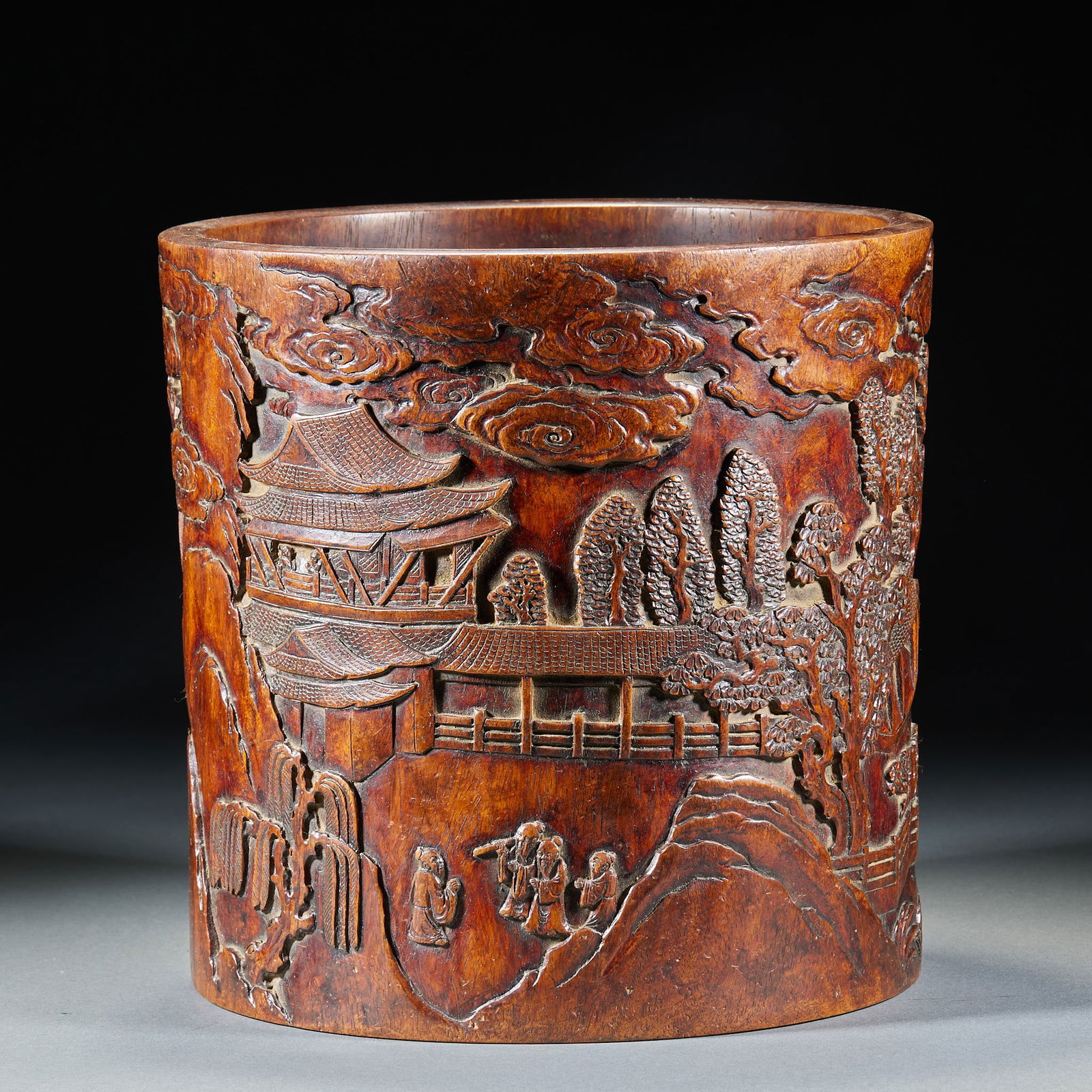 Brush Pot with Landscape and Pavilion Design, Huanghuali Wood: Huanghuali Brush Pot with Landscape and Pavilion Pattern, 22cm in height and 22.3cm in diameter, produced in the mahogany workshops in the Jiangnan region of the Qing Dynasty, it is a furnishing
