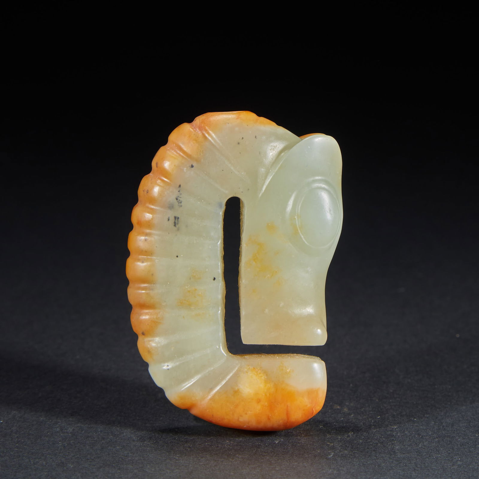 Horse-Head Dragon Jade, Hongshan Culture, Pre-Ming Dynasty: Hongshan Jade Horse-headed Dragon, before the Ming Dynasty, 5.5cm in height, 3.8cm in length, 1.5cm in width and 65g in weight, unearthed from the Hongshan Culture site and later collected privately.