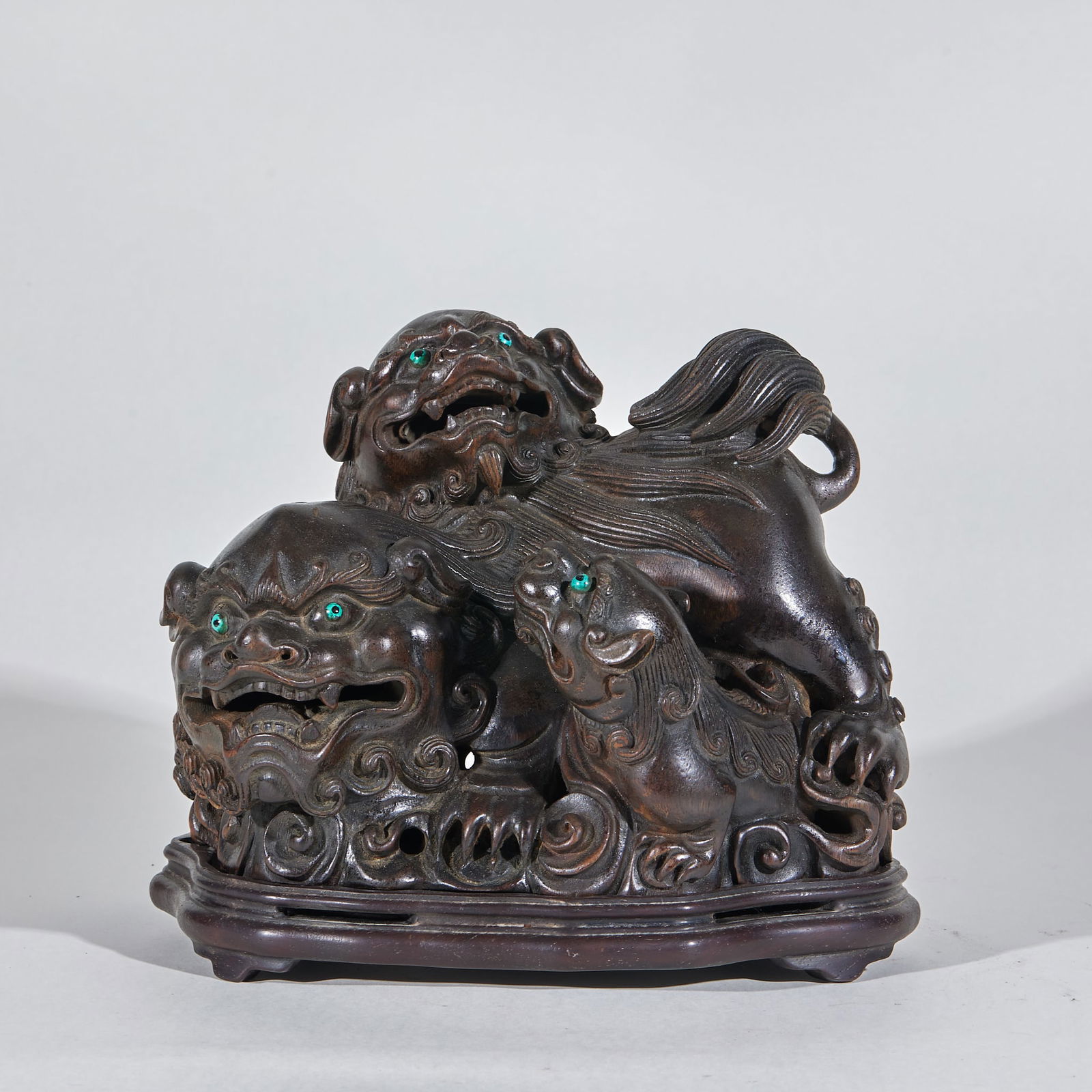 Senior and Junior Lions Ornament, Agarwood: Eaglewood Carving of a Big Lion with a Small Lion, 16cm in height, 21cm in length and 16cm in width. Produced by the Imperial Workshop of the Qing Dynasty, it was a furnishing article for the