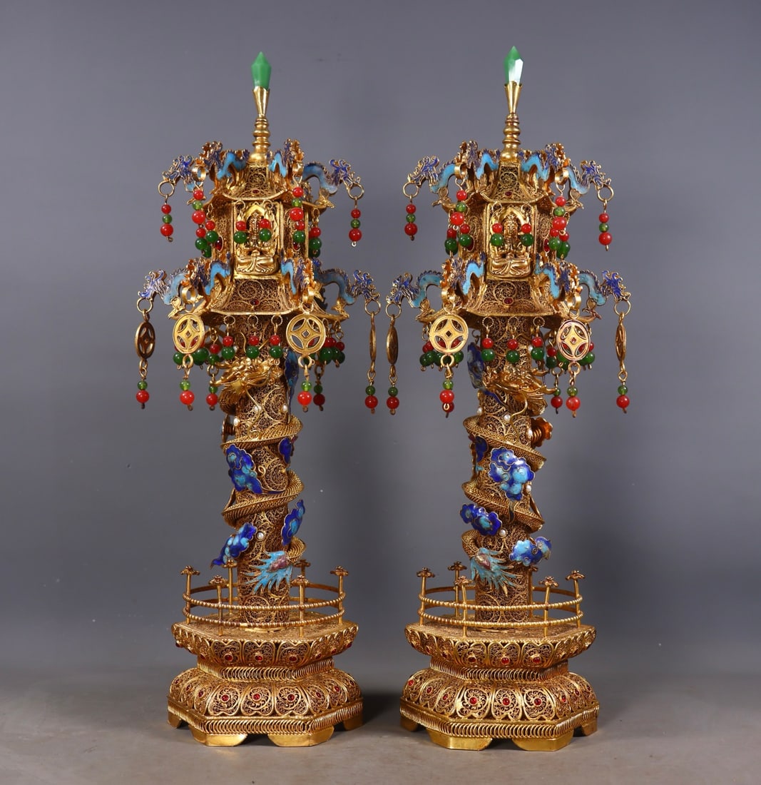A Pair of Coiled Dragon Pagodas, Filigree Gold with Precious Stone Inlay: A Pair of Filigree Gilt Pagodas with Inlaid Gemstones and Coiled Dragon Pattern, 44cm in height, 14cm in diameter and 2700g in weight. Produced by the Imperial Workshop of the Qing Dynasty, they were