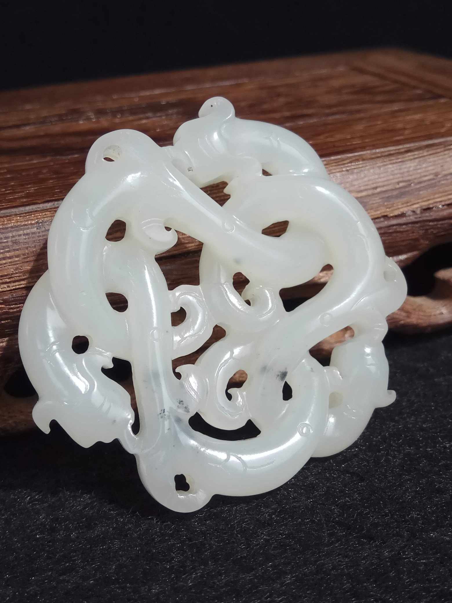 Archaic Hetian White Jade Seed Material Pendant with Openwork Mother and Child Chi-dragon Pattern,: Thickness 1.2cm, Diameter 5cm, Weight 27g, Unearthed from Han Dynasty noble tombs, similar artifacts are mostly found in high-grade tombs such as the King Chu Tomb at Shizishan in Xuzhou, Jiangsu and