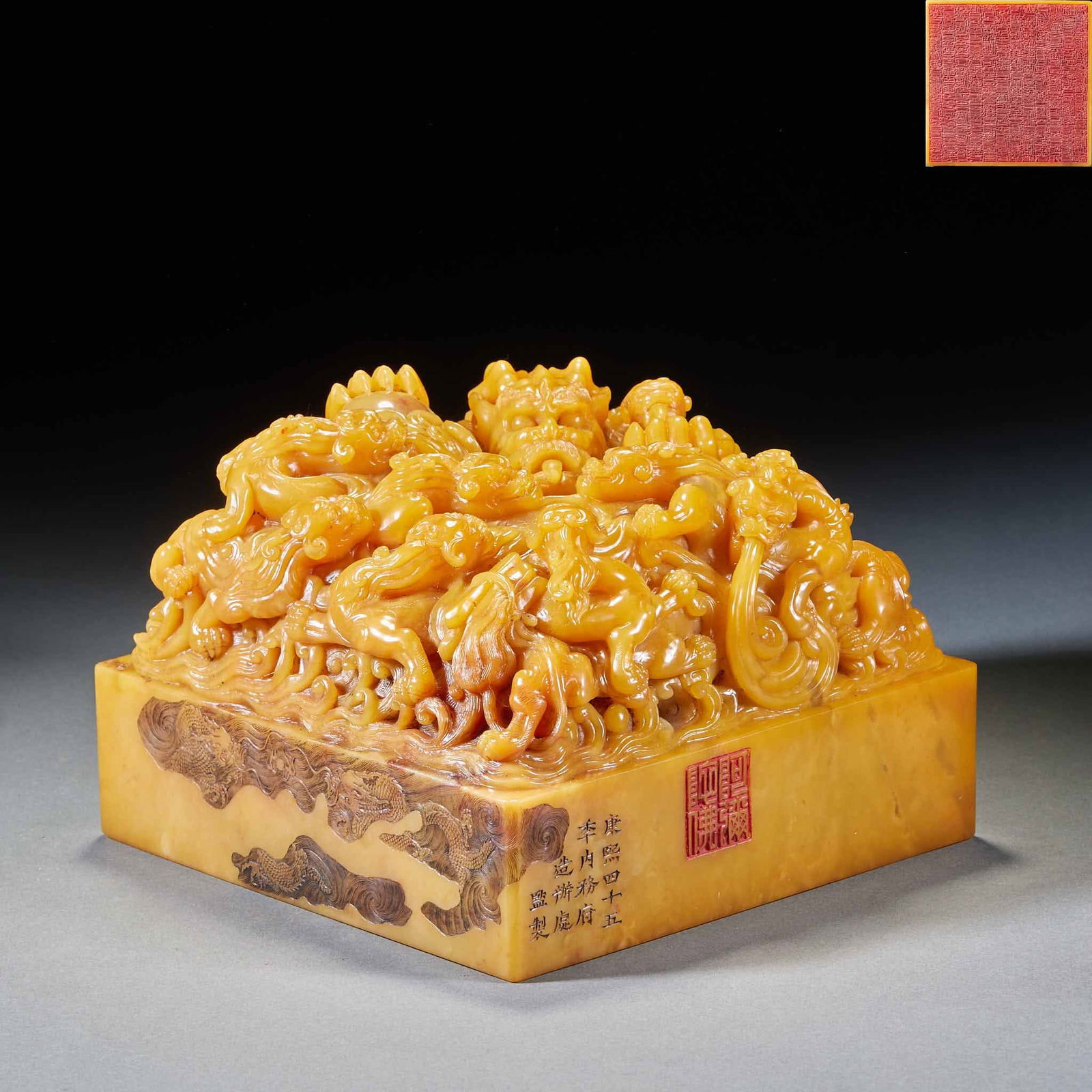 Tianhuang Stone Seal with Nine Dragons Playing a Pearl Pattern: Tianhuang Stone Seal with Nine Dragons Playing with a Pearl, 13cm in height, 18.5cm in length, 18.5cm in width and 8700g in weight, Made by imperial order of the Kangxi Imperial Workshop of the Qing