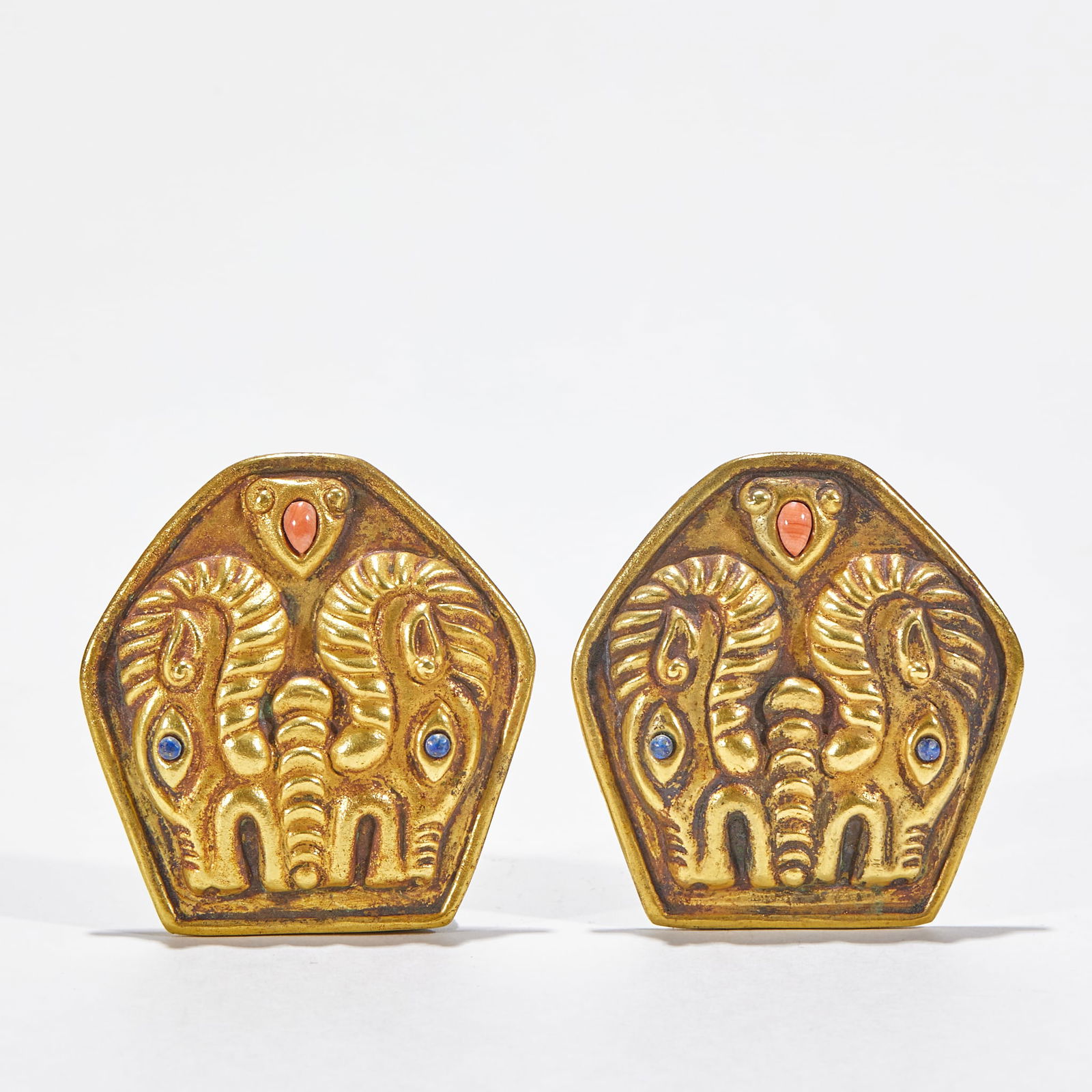 A Pair of Gilt-silver Plaquettes with Animal Mask Pattern: Length 5.2cm, Width 5cm, Weight 89g, A belt ornament for nobles of Western Regions nomadic peoples (such as the Turks and Uyghurs) from the Tang Dynasty to the Song Dynasty, similar artifacts are