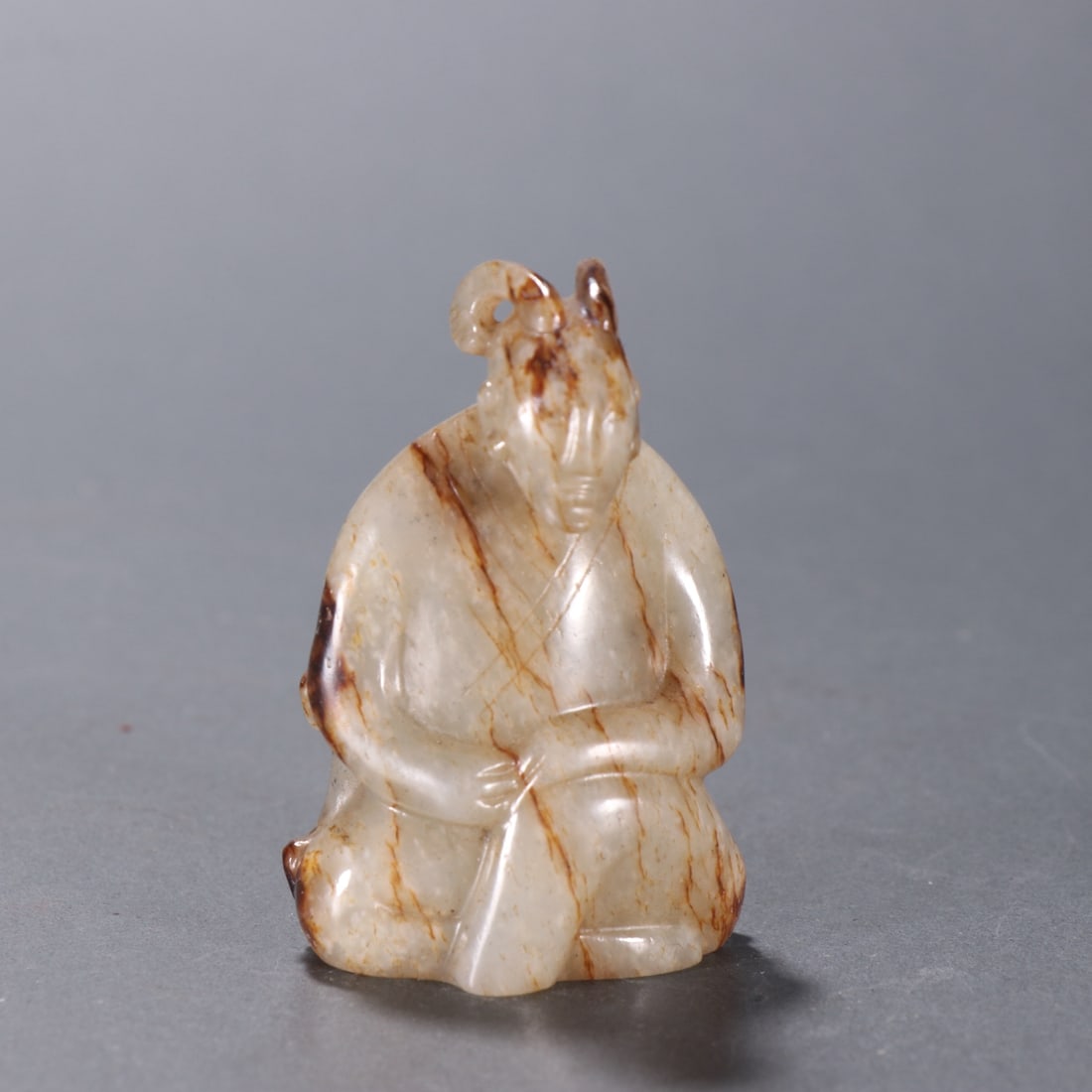 Figure Carving, High Ancient Jade: Archaic Jade Carving of a Human Figure, Height: 6.45cm, Width: 4cm, Weight: 88.2g, Produced by the jade carving workshop in the Central Plains from the Warring States Period to the Han Dynasty, it was