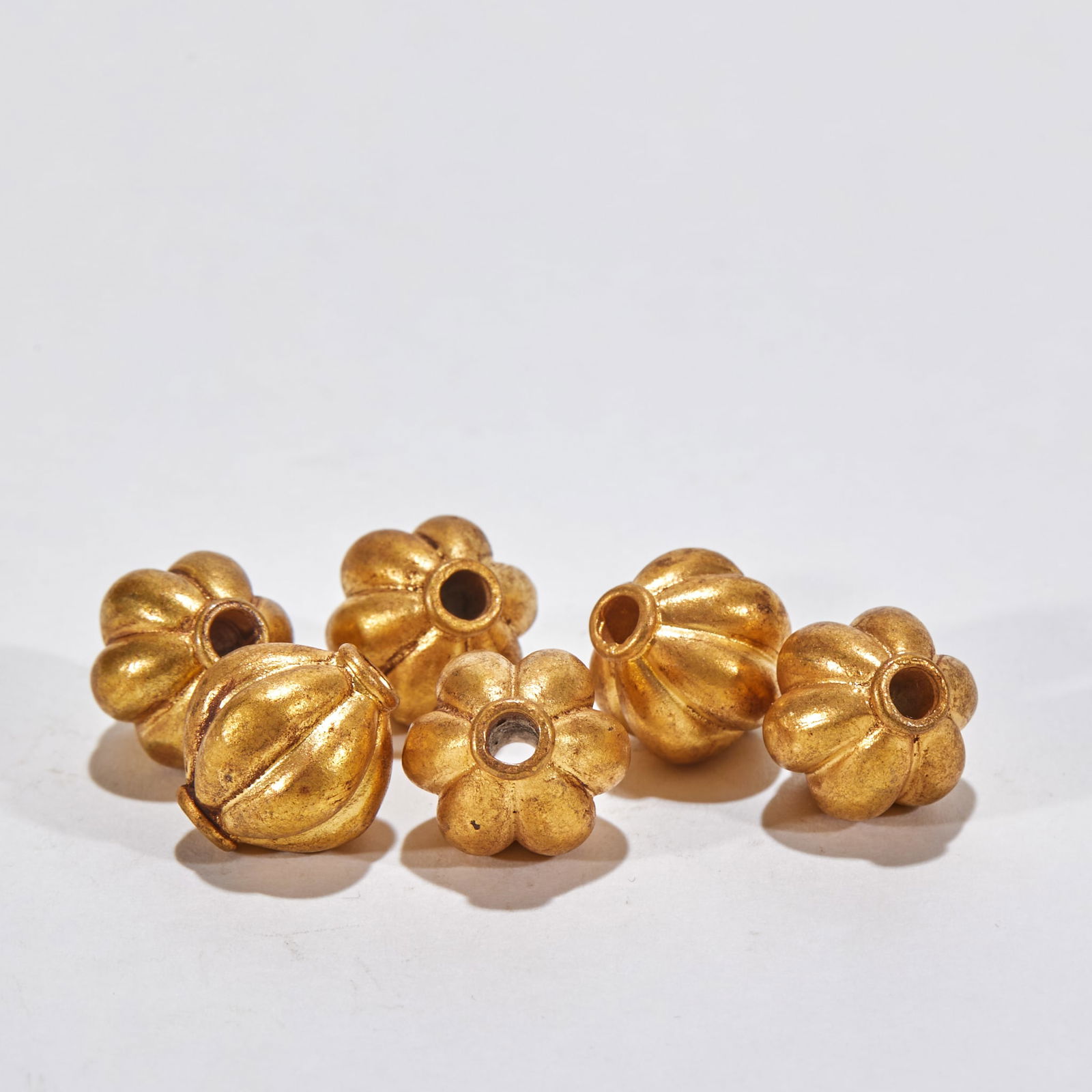 Melon-ribbed Spacer Bead: Length 1.3cm, Width 1.1cm, Weight 36g, An ornament of a set of jade pendants or Buddhist prayer beads for nobles from the Tang Dynasty to the Song Dynasty, similar artifacts are mostly found in sites