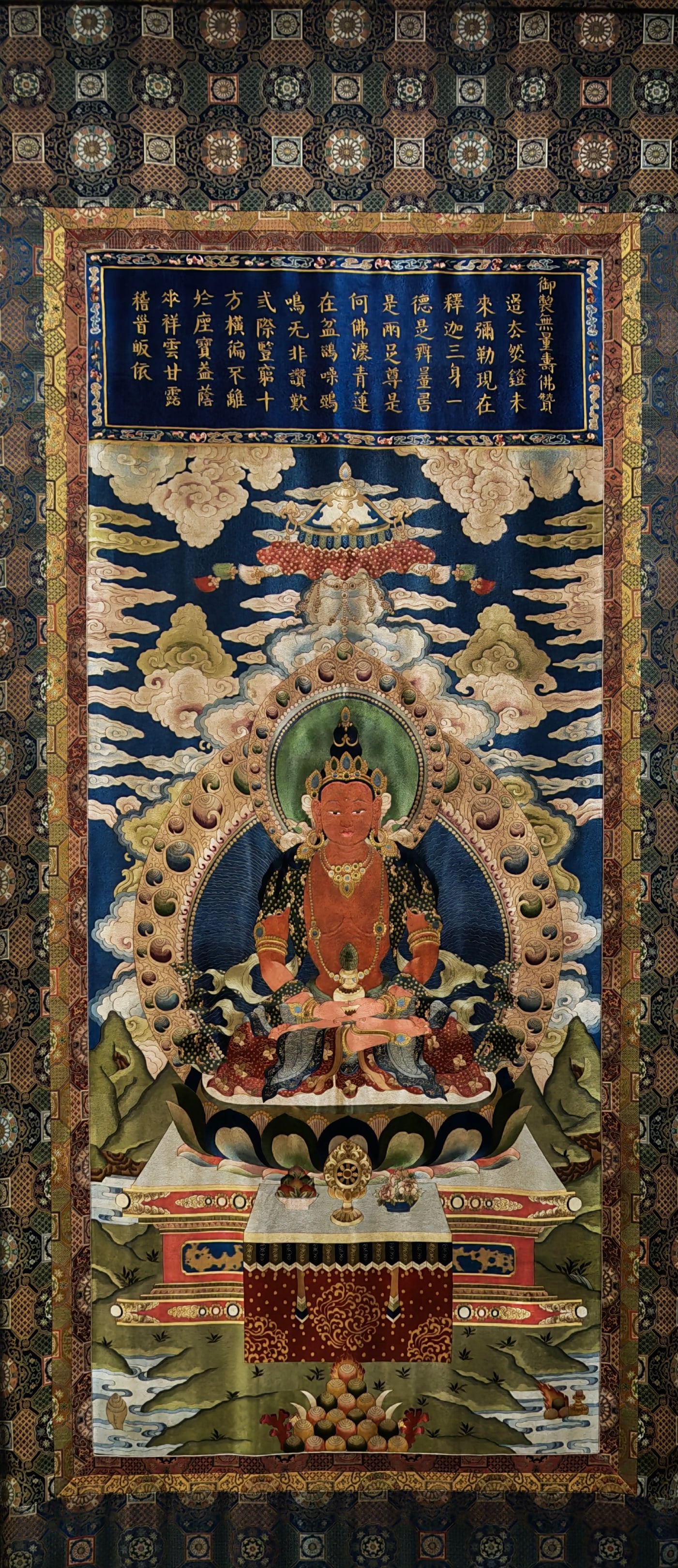 Imperially Made Embroidered Amitayus Buddha, Qing Dynasty: Embroidered Imperial Amitayus Buddha Thangka of the Qing Dynasty, the core painting with a length of 168 cm and width of 73 cm, made by the Imperial Workshop during the Qianlong period of the Qing