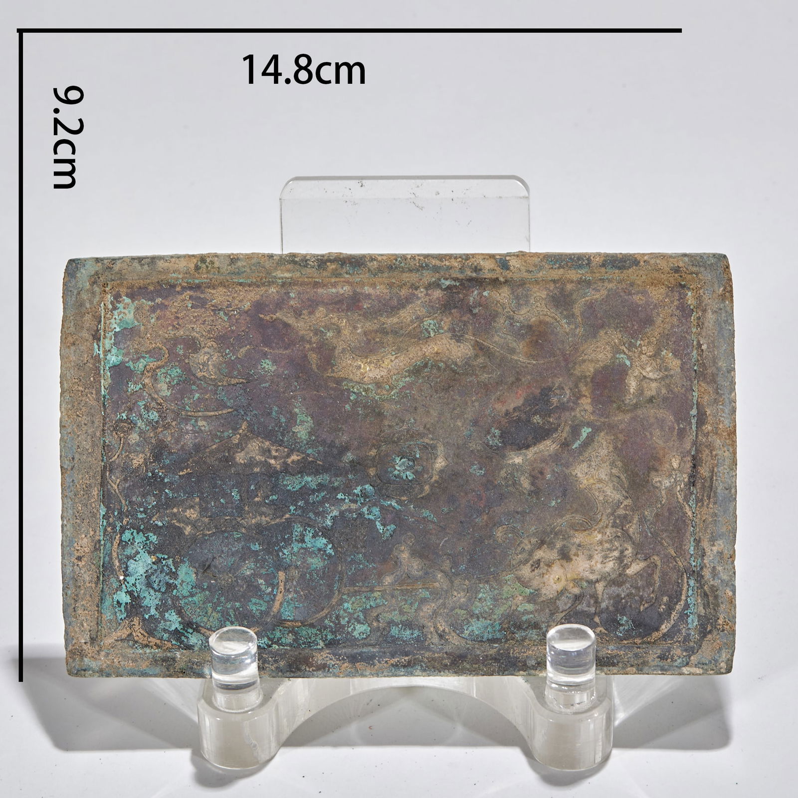 Gold and Silver Inlaid Bronze Mirror with Travel Scene, Pre-Ming Dynasty: Gold and Silver Inlaid Bronze Mirror with Travel Scene Before the Ming Dynasty, with a length of 14.8 cm and width of 9.2 cm, unearthed from a noble tomb in the late Warring States Period to the Han D