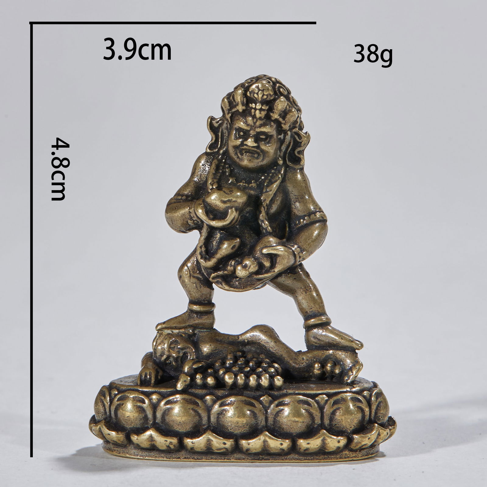 Bronze Cased Small Black Jambhala Buddha Statue: Gilt-Bronze Small Statue of Mahakala (Cun Fo), height 4.8 cm, length 3.9 cm, width 2 cm. A portable small Buddha enshrined in Tibetan Buddhist monasteries in the Qing Dynasty, made by the inland