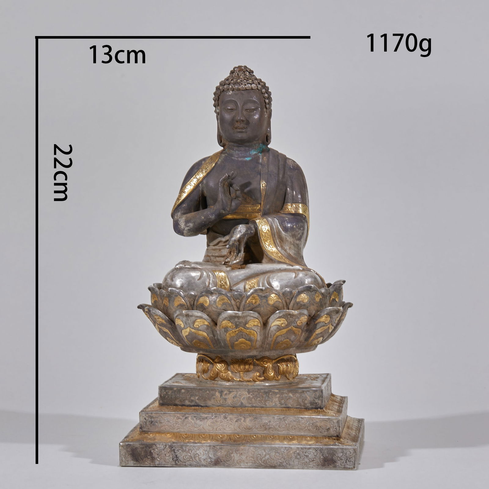 Pure Silver Gilt Seated Sakyamuni Buddha on a Lotus Base: Gilt-Pure Silver Sakyamuni Buddha on a Lotus Throne, height 22 cm, length 13 cm, width 13 cm, weight 1170 g. A Buddha statue enshrined in Tibetan Buddhist monasteries in the Qing Dynasty, made by the