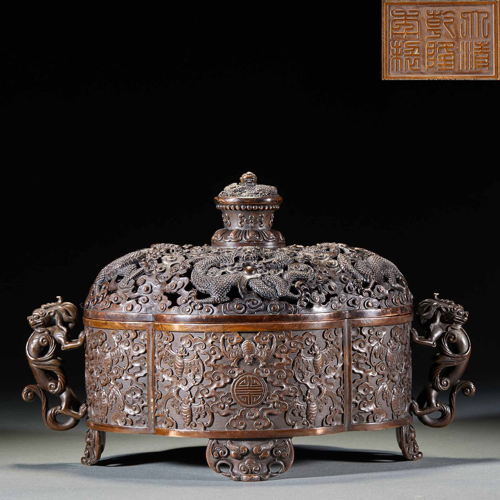 Bronze Censer with Dragon Pattern and Auspicious Beast Ears, Marked "Made in the Qianlong Reign of: Bronze Censer with Dragon Patterns and Auspicious Beast Ears with the Mark of Made in the Qianlong Reign of the Great Qing, height 18 cm, length 28 cm, width 18 cm, weight 3108 g. Imperial utensil