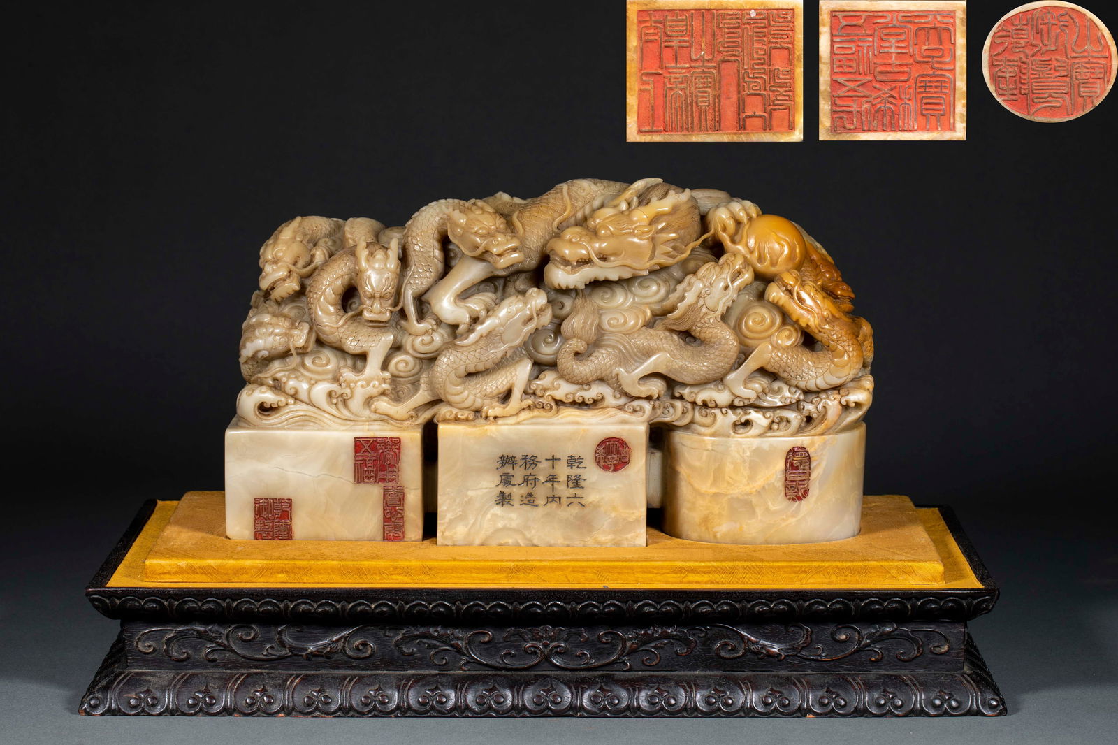 Tianhuang Stone Linked Seals with Nine Dragons Playing with a Pearl Motif, Marked Qianlong Reign: A Qianlong period Tianhuang stone Nine Dragons Playing with a Pearl seal and its seal impression, 17.5 cm high, 30 cm long and 9 cm wide, weighs 8750g.