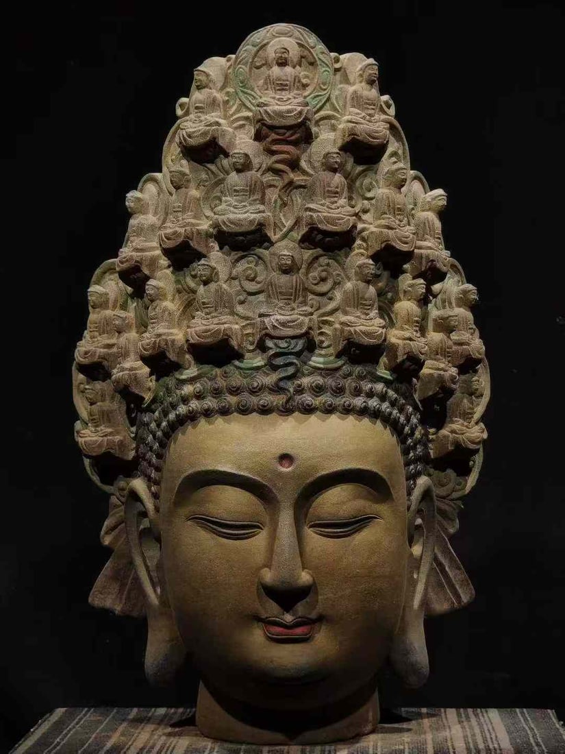 Blue Stone Guanyin Head, Sui Dynasty: Sui Dynasty's green stone Guanyin head, measuring 67cm in height, 43cm in length and 33cm in width.