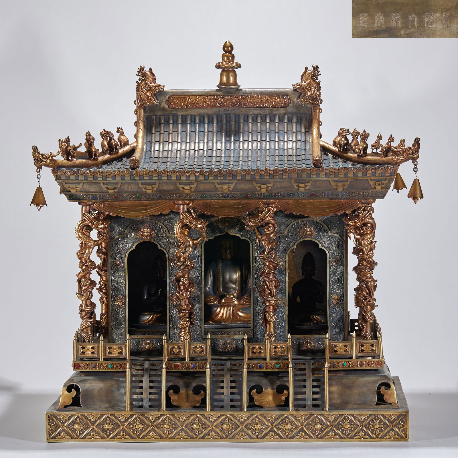 Qianlong Imperial Household Collection Gilt Bronze Buddha Niche: Gilded bronze Buddhist shrine collected by the Imperial Household Department in the Qianlong period. Height 66cm, length 62cm, width 43cm. Made by the Imperial Workshop during the Qianlong period for