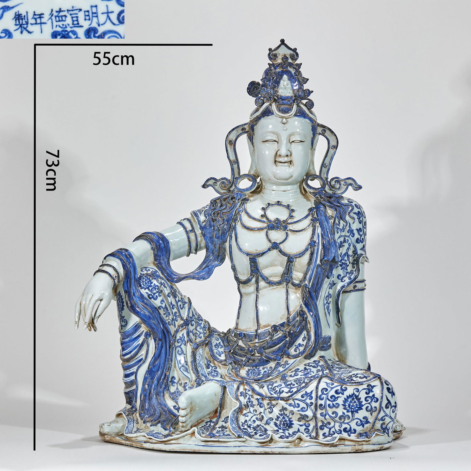 Blue and White Guanyin Buddha Seated Statue of the Xuande Period of the Ming Dynasty: Blue and white Guanyin statue marked 'Xuande of the Ming Dynasty'. Height 73cm, length 55cm, width 35cm. Official kiln product of Jingdezhen during the Xuande period for imperial worship. Kaolin clay