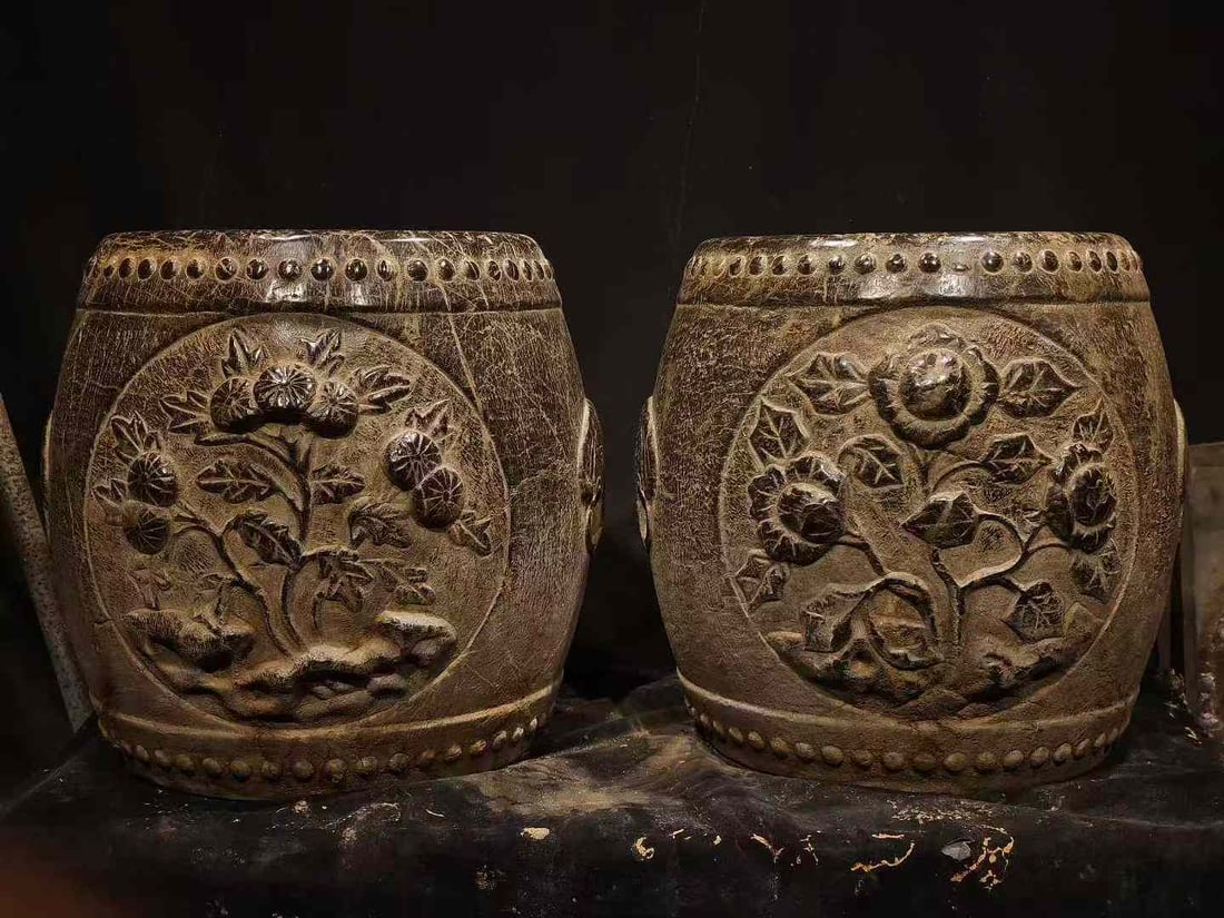 A pair of small stools: Pair of Garden Stools. Height 43cm, length 45cm, width 42cm. Used in courtyards and halls of wealthy families in Jiangnan or northern China during the Ming and Qing Dynasties, mostly custom-made