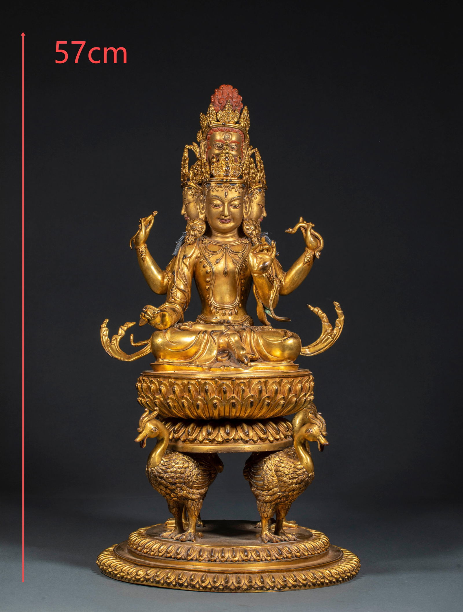 Yongle period gilt copper Four-Armed Guanyin: Yongle Gilded Bronze Four-Armed Guanyin, Ming Dynasty. Height 57cm, length 30cm, width 28cm, weight 15800g. Made by the Ming Imperial Workshop in Yongle period for imperial worship. Gilded bronze