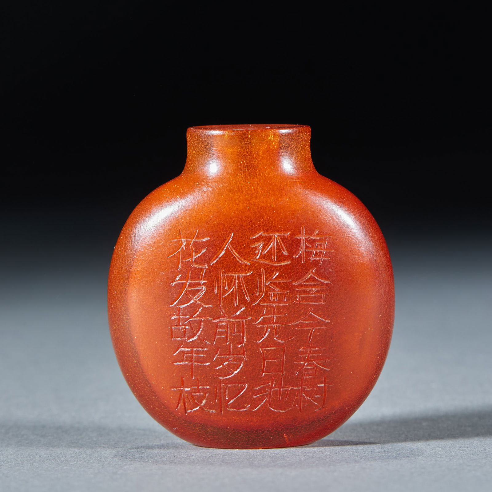 Honeycomb Amber Plum Blossom Poem Snuff Bottle: Amber Plum Blossom Poem Snuff Bottle. Height 5cm, length 4.5cm, width 2.4cm, weight 19g. Qing scholar’s studio vessel, a fine snuff bottle. Amber (or beeswax) with intaglio poems. Intaglio carved
