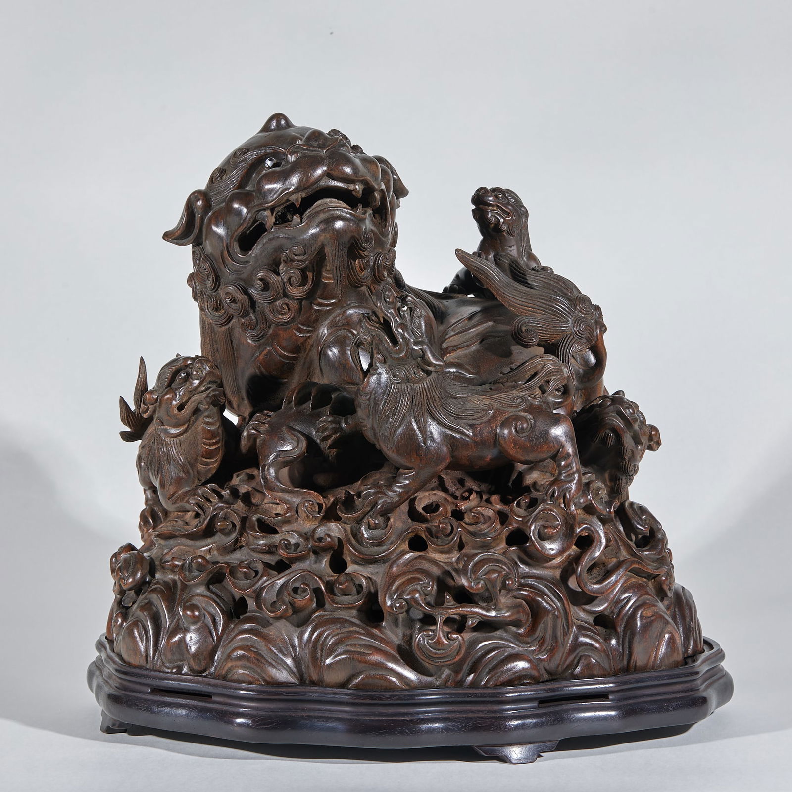 Incense burner with a pair of lions made of agarwood: The rare lion and little lion figurine is 36 cm tall, 38 cm long and 28 cm wide. It was used for decoration in the imperial or noble halls of the Qing Dynasty. It is a auspicious piece featuring the t