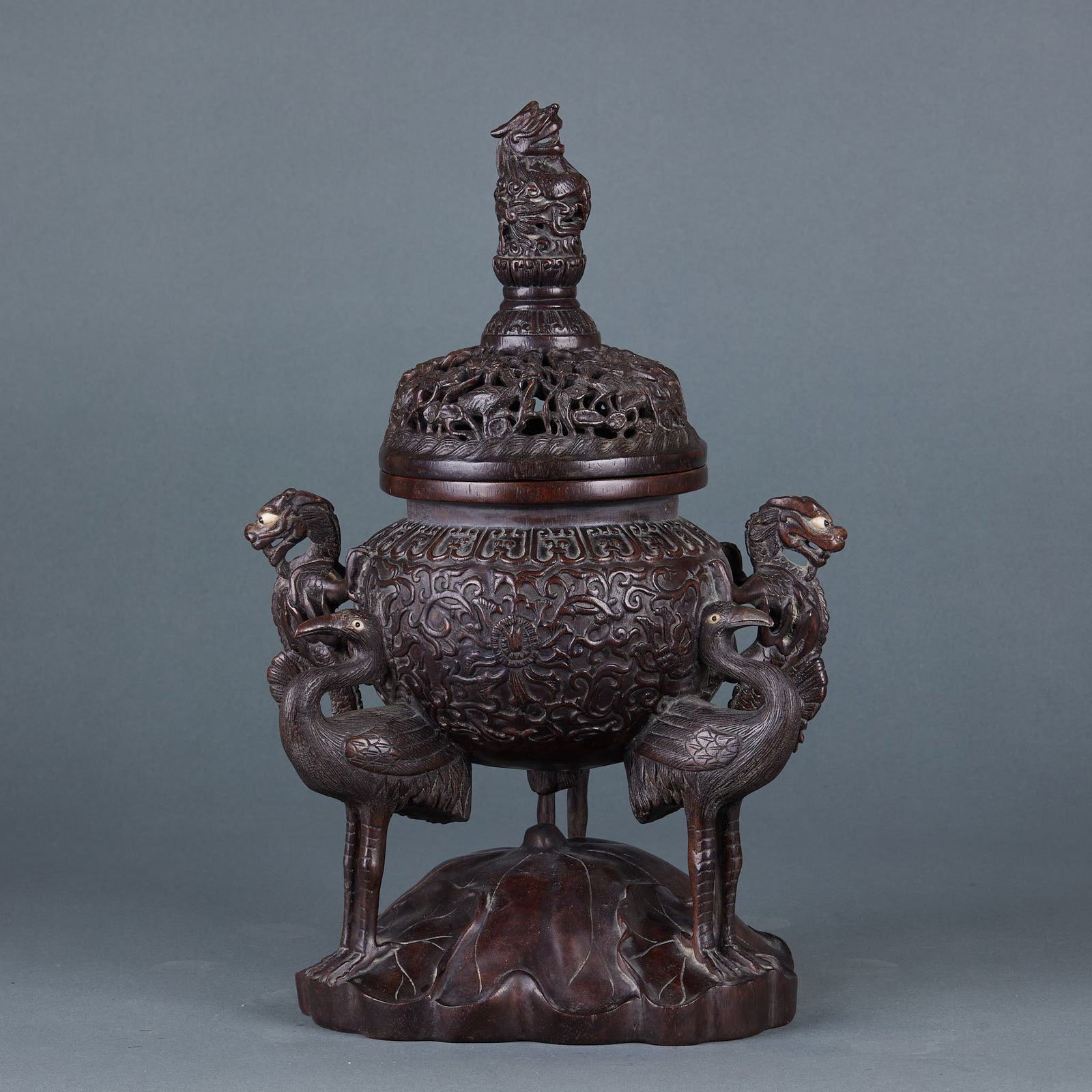 Agarwood incense burner with crane feet and dragon ears: Sinking Wood, Crane-Feet Dragon-Head. The height of the incense burner is 39 cm and the diameter is 20 cm. It is a piece of incense container or decorative item from the Qing Dynasty, used for burning
