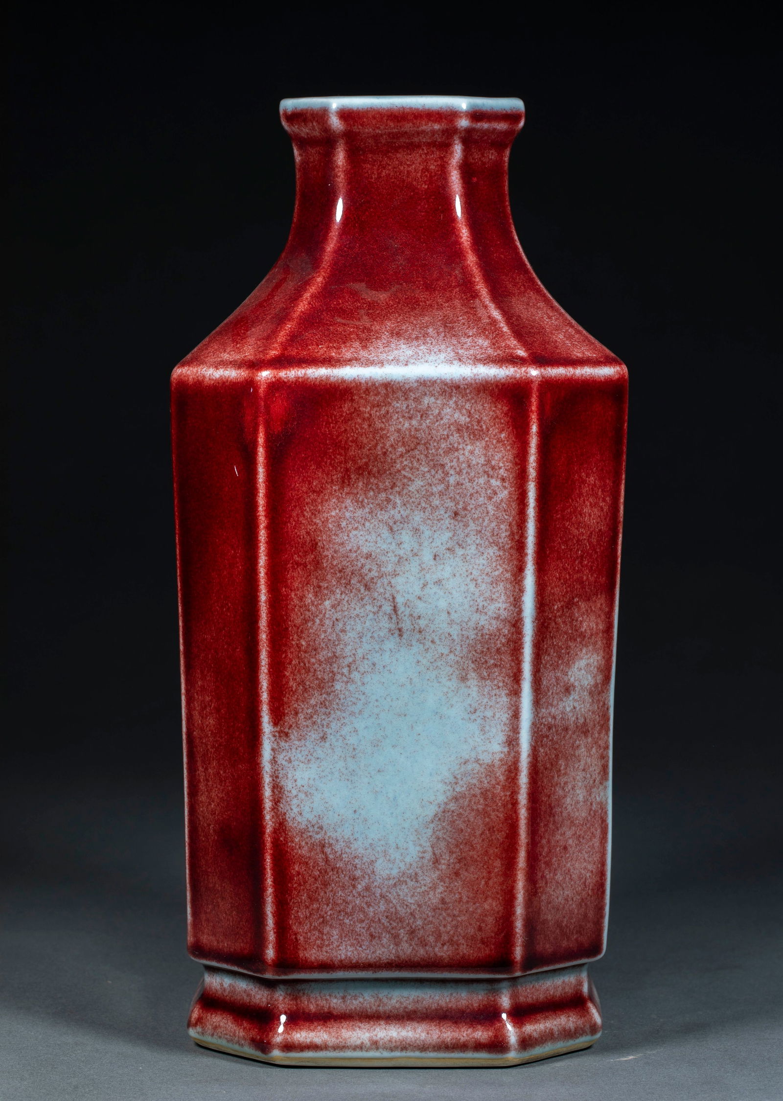 Qianlong period underglaze red square bottle: Qing Dynasty (Emperor Qianlong) Glazed Red Patterned Square Vase, height 33 cm, length 15 cm, width 15 cm. Made during the reign of Emperor Qianlong at the Jingdezhen Imperial Kiln, it was a piece