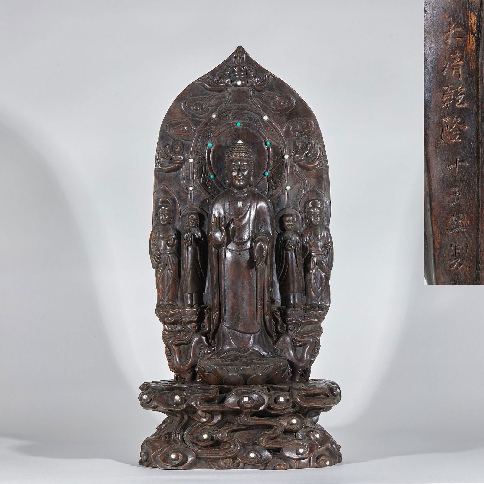Agarwood Buddha Sakyamuni preaching statue: The statue of Shakyamuni Buddha preaching the Dharma is 63 cm tall, 29 cm long and 15 cm wide. It is a Buddhist statue from the Qing Dynasty's imperial court or temple, with the inscription "Made in