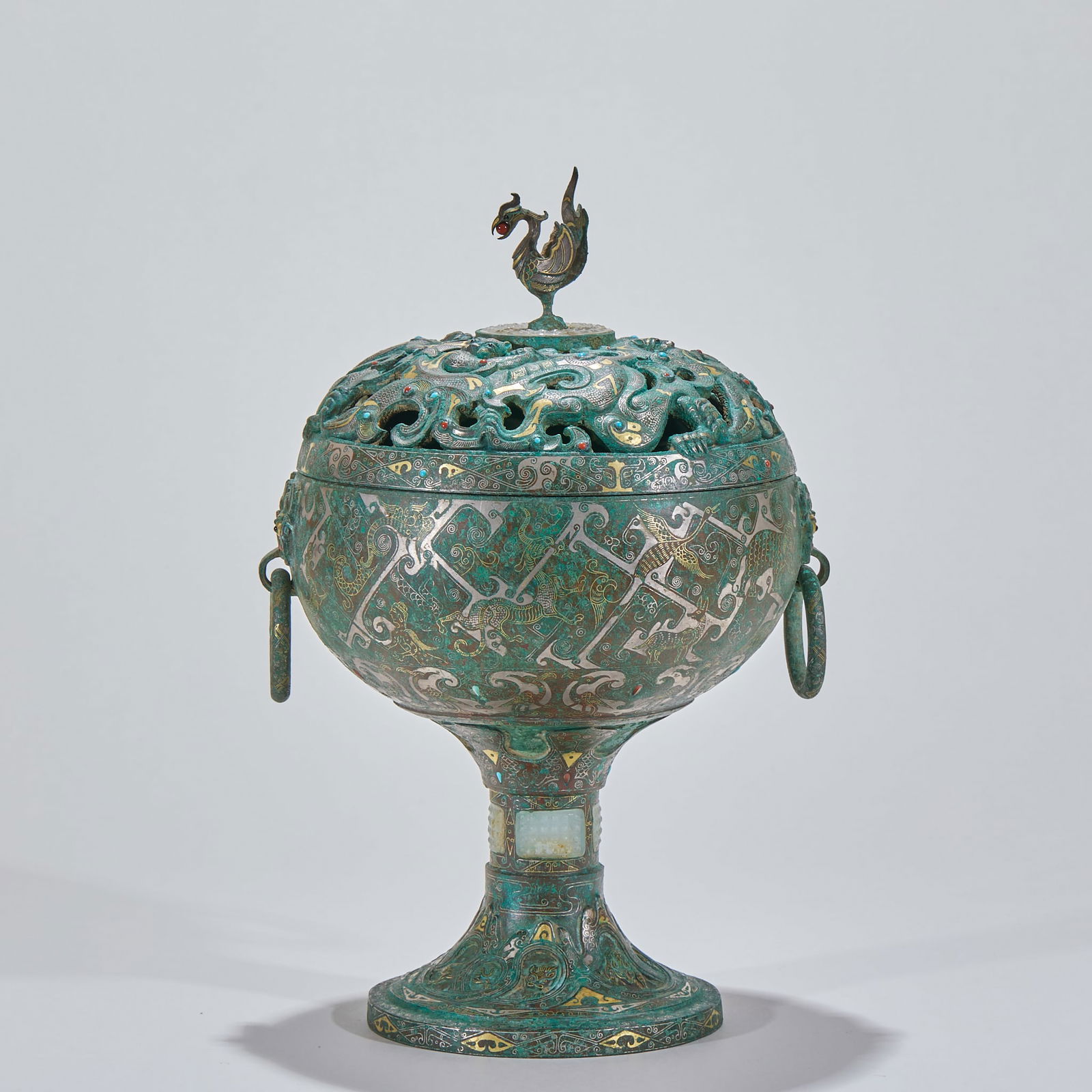 Gold and Silver Inlaid Boshan Furnace with Hundred Beasts Pattern and Jade Inlay: Gold and Silver Inlaid Jade Boshan Censer with Hundred Beasts Pattern. Height 30cm, diameter 18cm. Han Dynasty or Wei-Jin Period. A incense vessel influenced by Taoist “Boshan” worship. Bronze