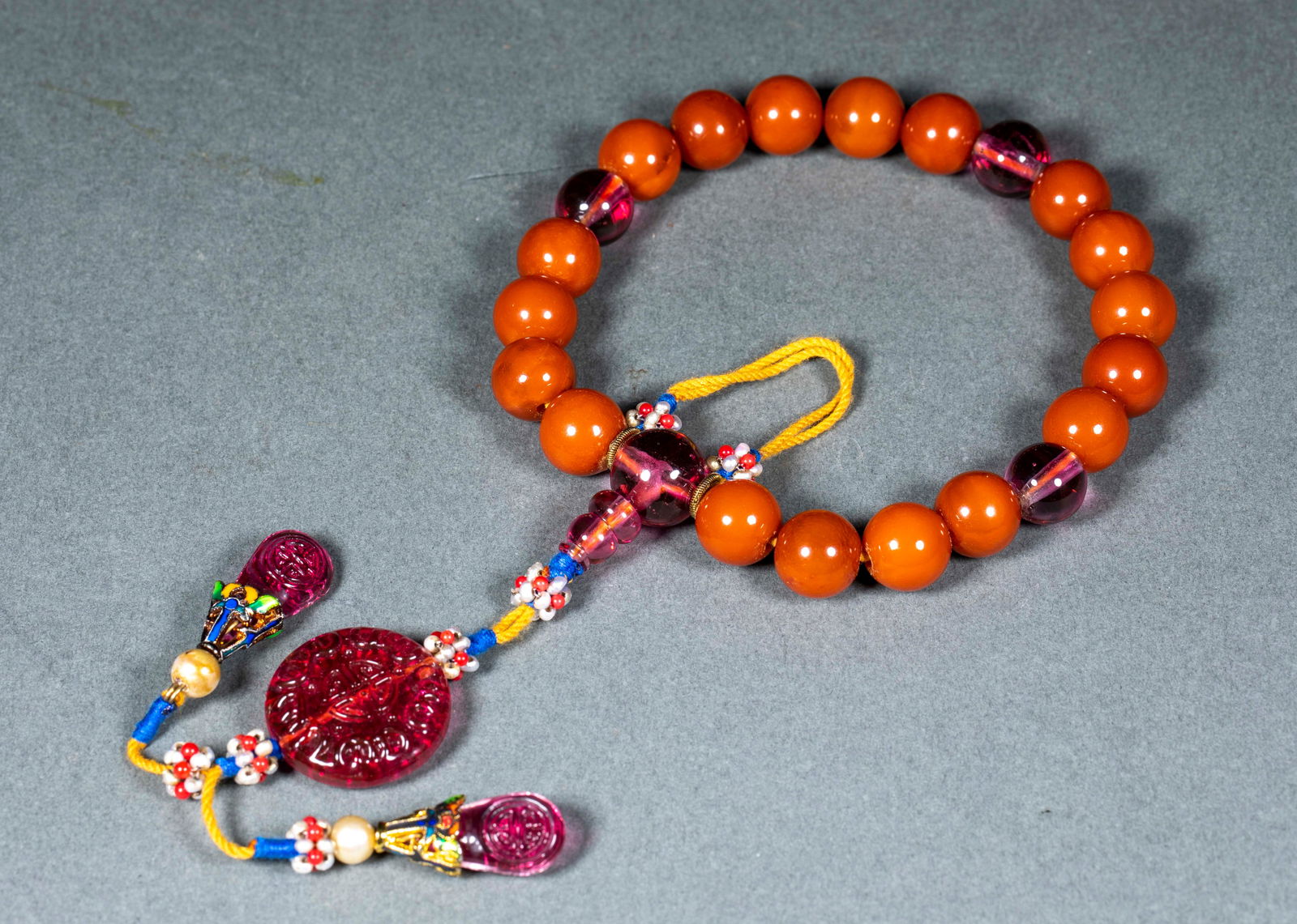 Beeswax Wrist Beads: Beeswax Prayer Beads, single diameter 1.2cm, 48.5g. Qing or modern Buddhist prayer beads. Mainly round beeswax beads, with amethyst, pearl, and enamel back?cloud. Polished, drilled, and inlaid, with