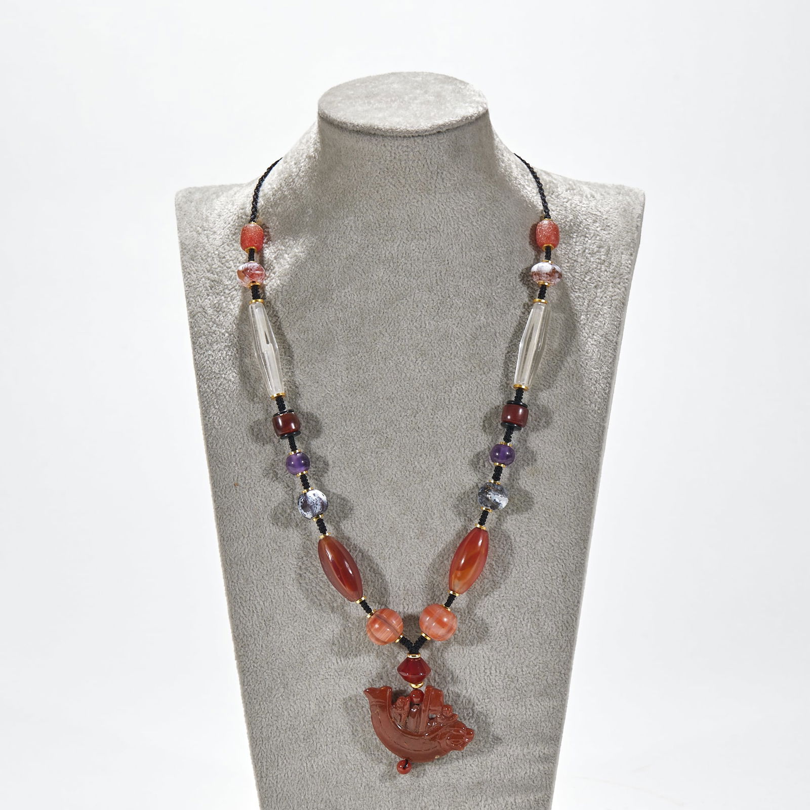 Pendant with Beeswax, Agate and Crystal Beads: Beeswax, Agate, and Crystal Pendant, beeswax length 5cm, width 3.4cm. Qing or modern “multi?treasure” necklace. Mainly beeswax, agate, crystal, and amethyst, strung on black cord. Polished,