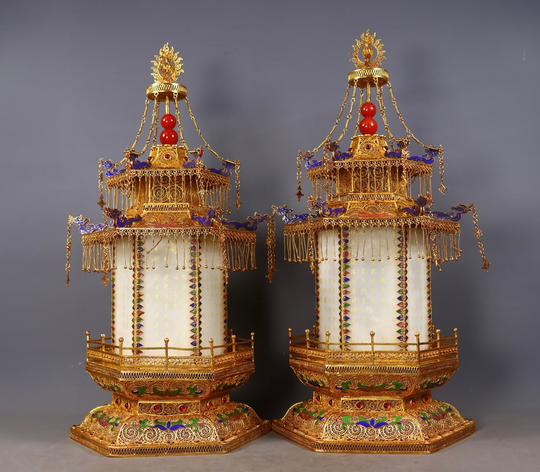 A Pair of Filigree Gilded Palace Lanterns Inlaid with Hotan Jade, Qing Dynasty: Qing Filigree Gilt Hotan Jade Palace Lantern Pair, height 47cm, diameter 23.5cm, 5510g. Qing court or noble palace lanterns. Silver?gilt, inlaid with Hotan jade, rubies, and turquoise, jade sheets wit