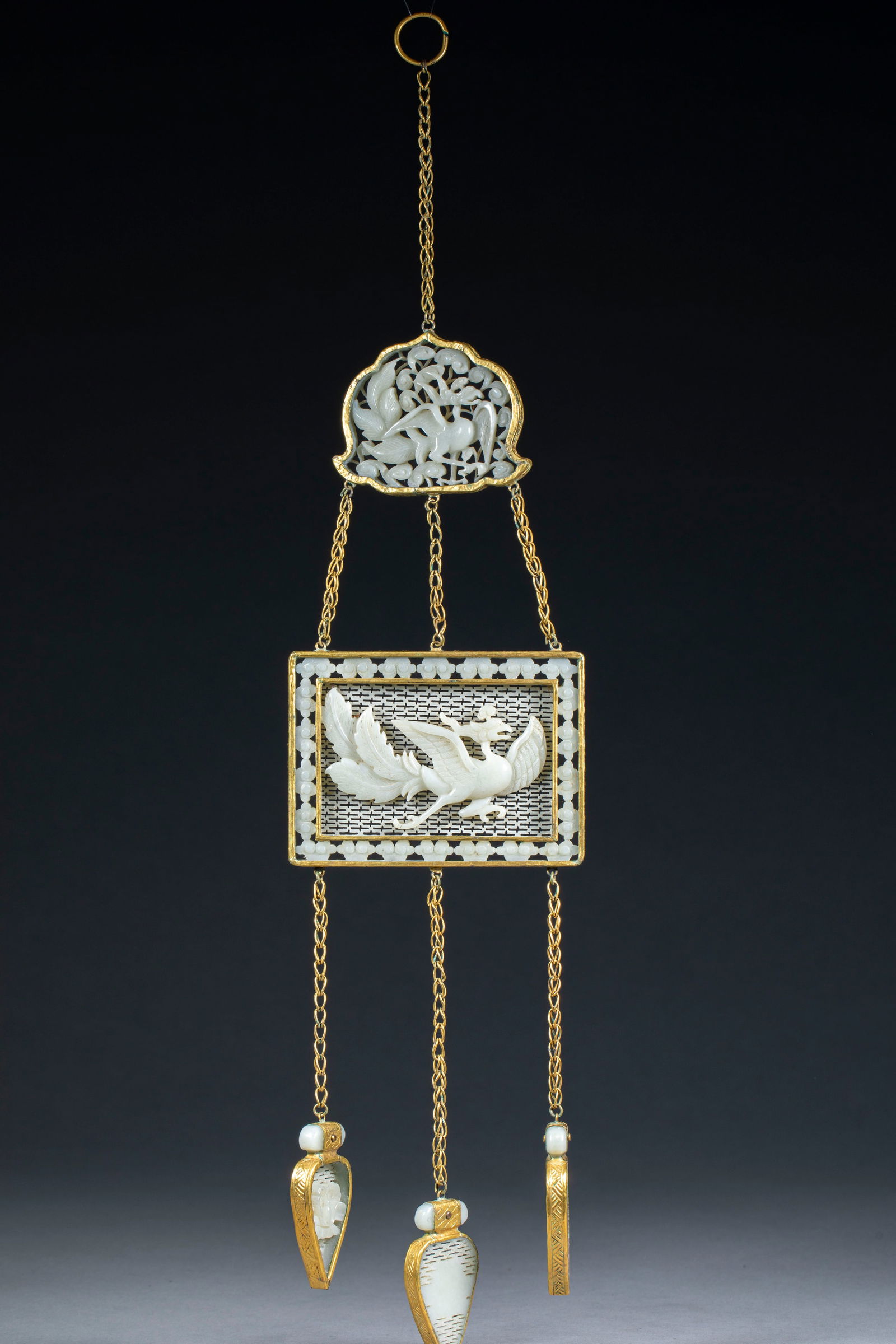 Exquisitely Carved Openwork Jade Plaque with Phoenix Pattern: Openwork Phoenix Jade Plaque, height 1cm, length 36cm, width 10.8cm, 225g. A high-ancient jade ornament of the Qing Dynasty or earlier, themed “phoenix” for auspiciousness. Hotan white jade wi