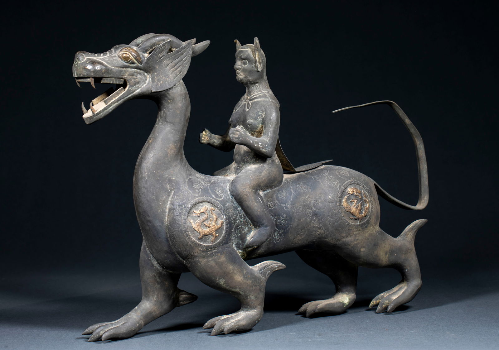 Silver-Gilded Statue of Deity Riding Dragon, Pre-Ming Dynasty: Pre-Ming Gilt Silver Deity Riding Dragon, 29cm × 40cm × 8.5cm