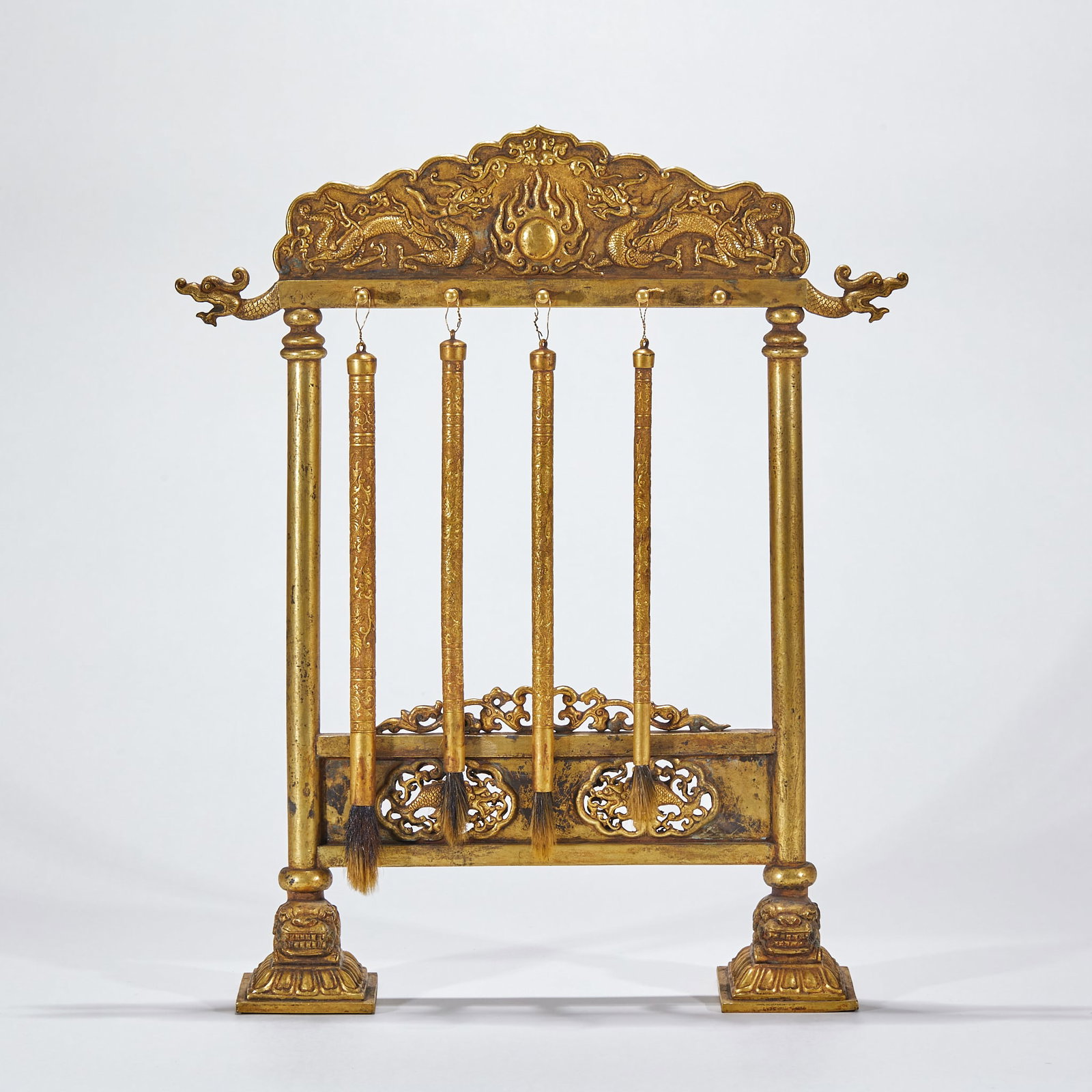 Copper Gilded Dragon Playing with Pearl Brush Rest: Gilt Bronze Brush Rest with Dragon Playing with Pearl, Height 41cm, Length 28.5cm, Width 8cm. A scholarly desk ornament mostly used in imperial or wealthy households of the Qing Dynasty. Full-body