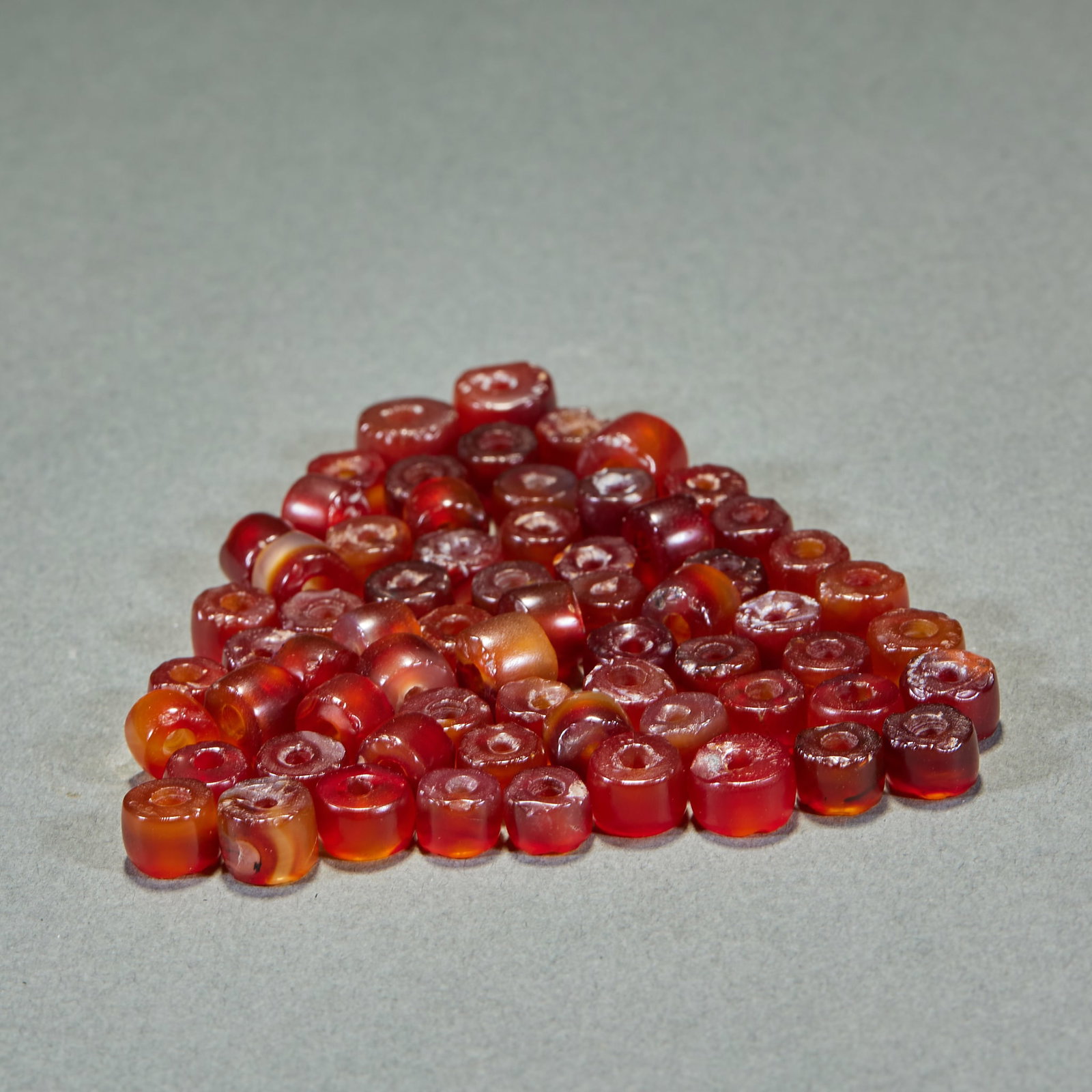 Set of Sixty-Six Agate Beads: Group of Sixty-Six Agate Beads, Single Bead Diameter 1cm. Archaic string ornaments, possibly relics from Western Zhou or Warring States to Han Dynasty. Red agate (or sardonyx) tube beads with polished