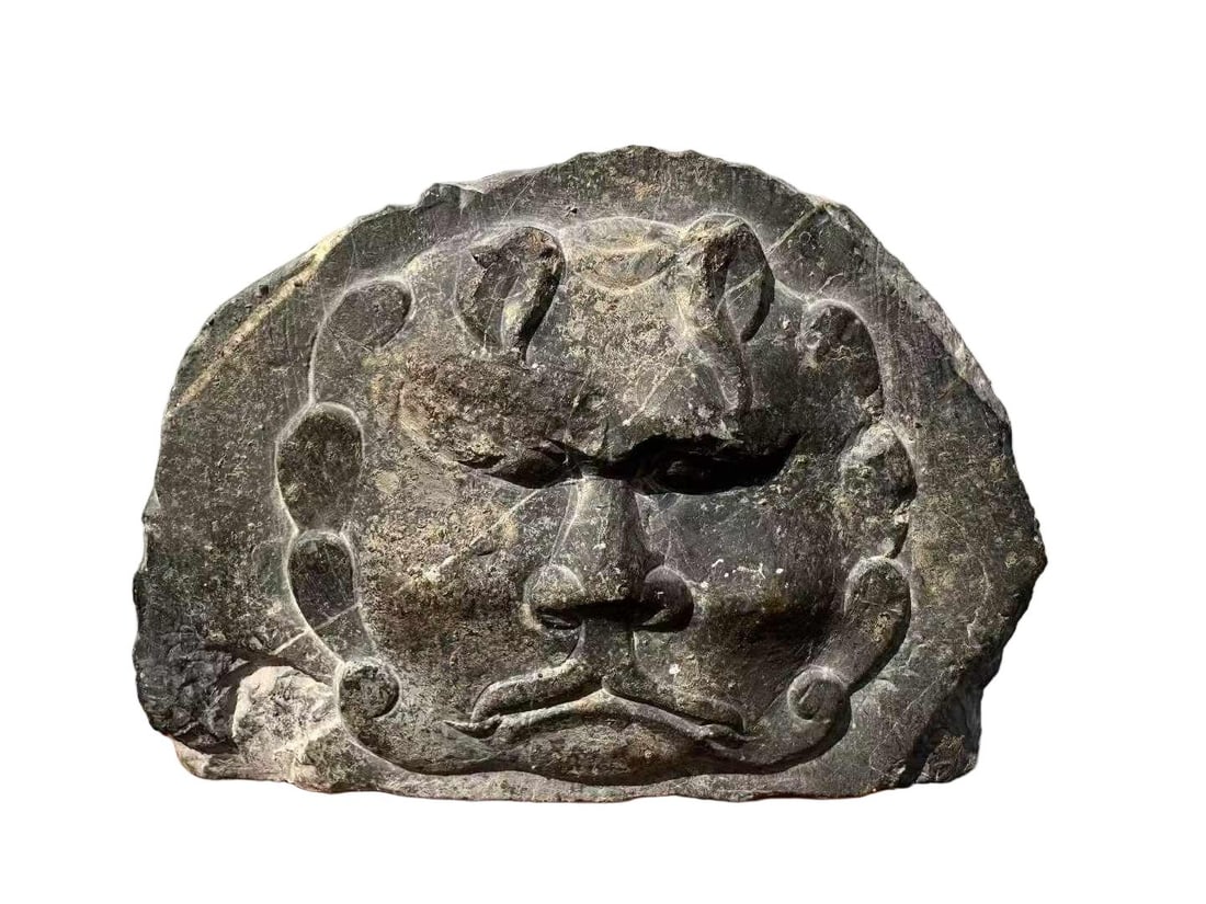 Northern and Southern Dynasties Bluestone Animal Mask: Northern and Southern Dynasties Bluestone Beast Mask, Height 14cm, Length 20cm, Width 6cm. An architectural component or grotto decoration of the Northern and Southern Dynasties (420–589 AD), uneart