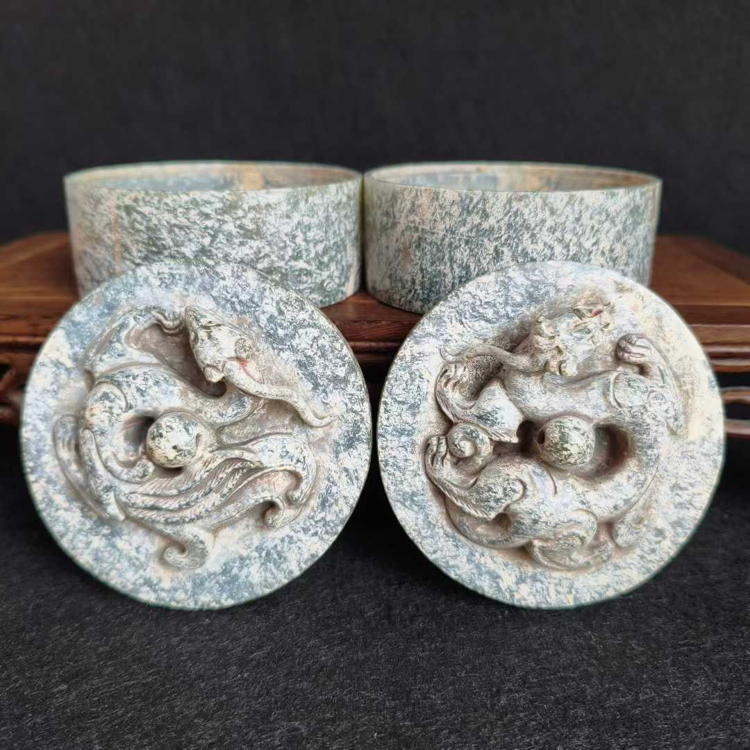 Pair of Hetian Green Jade Boxes with Dragon and Phoenix Patterns: Pair of Hetian Green Jade Boxes with Dragon and Phoenix Patterns, Height 5.6cm, Diameter 7.8cm, 583g. Archaic ritual jades or scholarly stationery used by nobles from Warring States to Han Dynasty,
