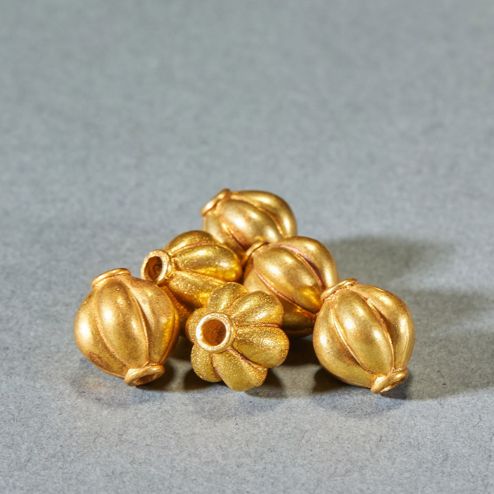 Accessory Spacer Beads 04: Accessory Spacer Bead 04, Diameter 1.3cm. An ancient string ornament accessory mostly seen in Tibetan Buddhist or archaic noble bead strings. Melon-shaped surface. Using hammering and molding