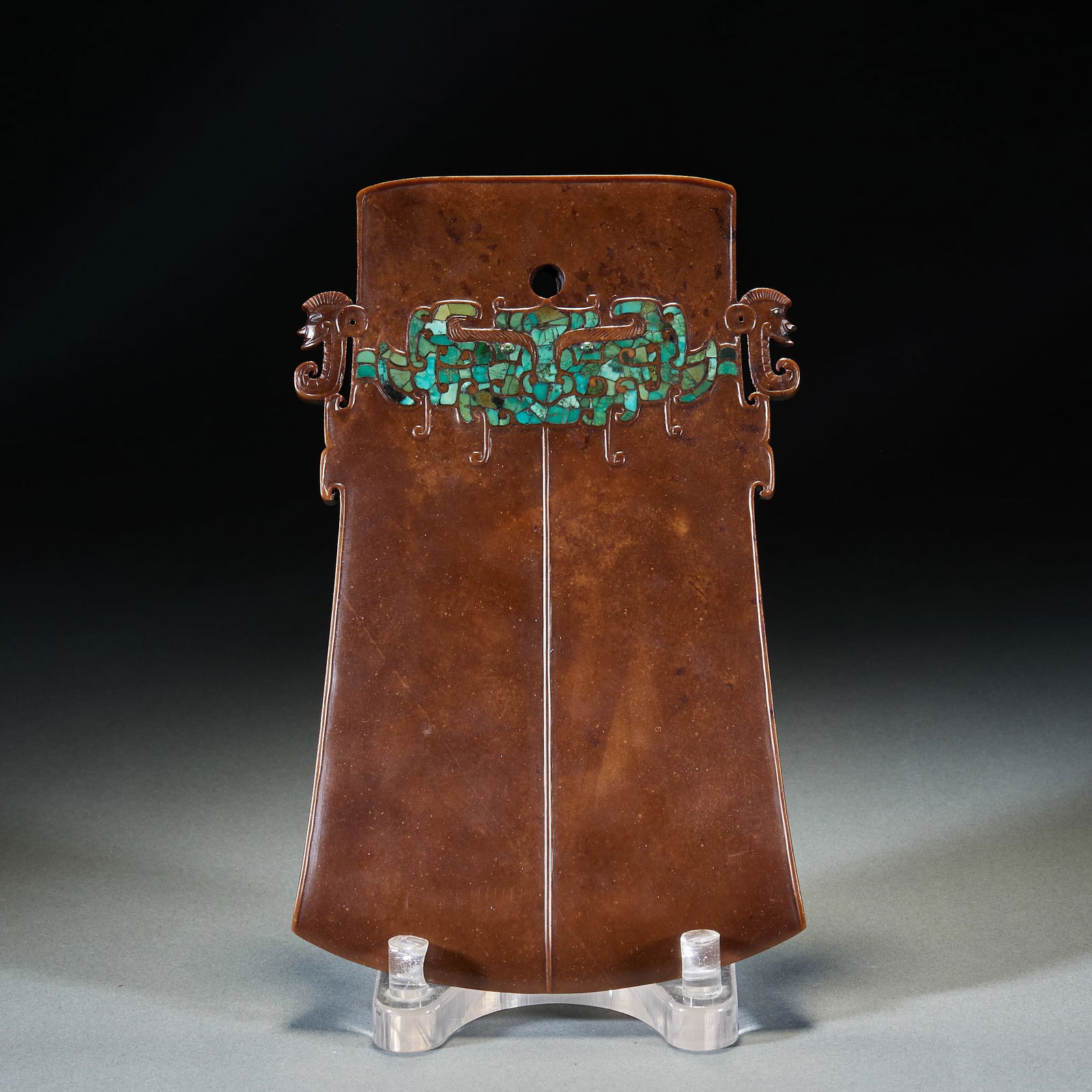 Shang Dynasty Jade Yue Axe with Taotie Pattern and Turquoise Inlays: Shang Dynasty Taotie Pattern Turquoise Inlaid Jade Axe, Length 26cm, Width 16cm. A high-ranking noble ritual vessel of late Shang Dynasty, evolved from jade axes symbolizing military power and sacrifi