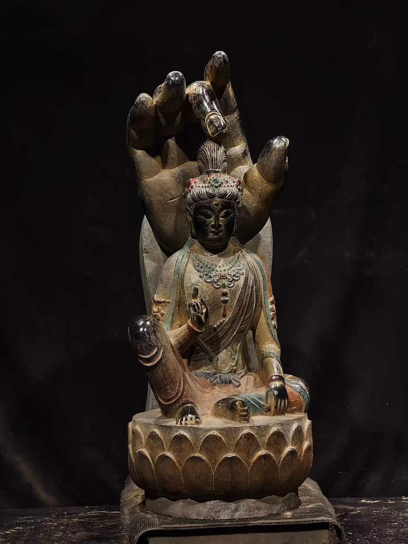 Bluestone Painted Guanyin: Polychrome Stone Statue of Guanyin, height 70cm, length 50cm, width 30cm. Buddhist statue dating from the Tang to Song dynasties, originating from temples or grottoes in the Central Plains. Designed