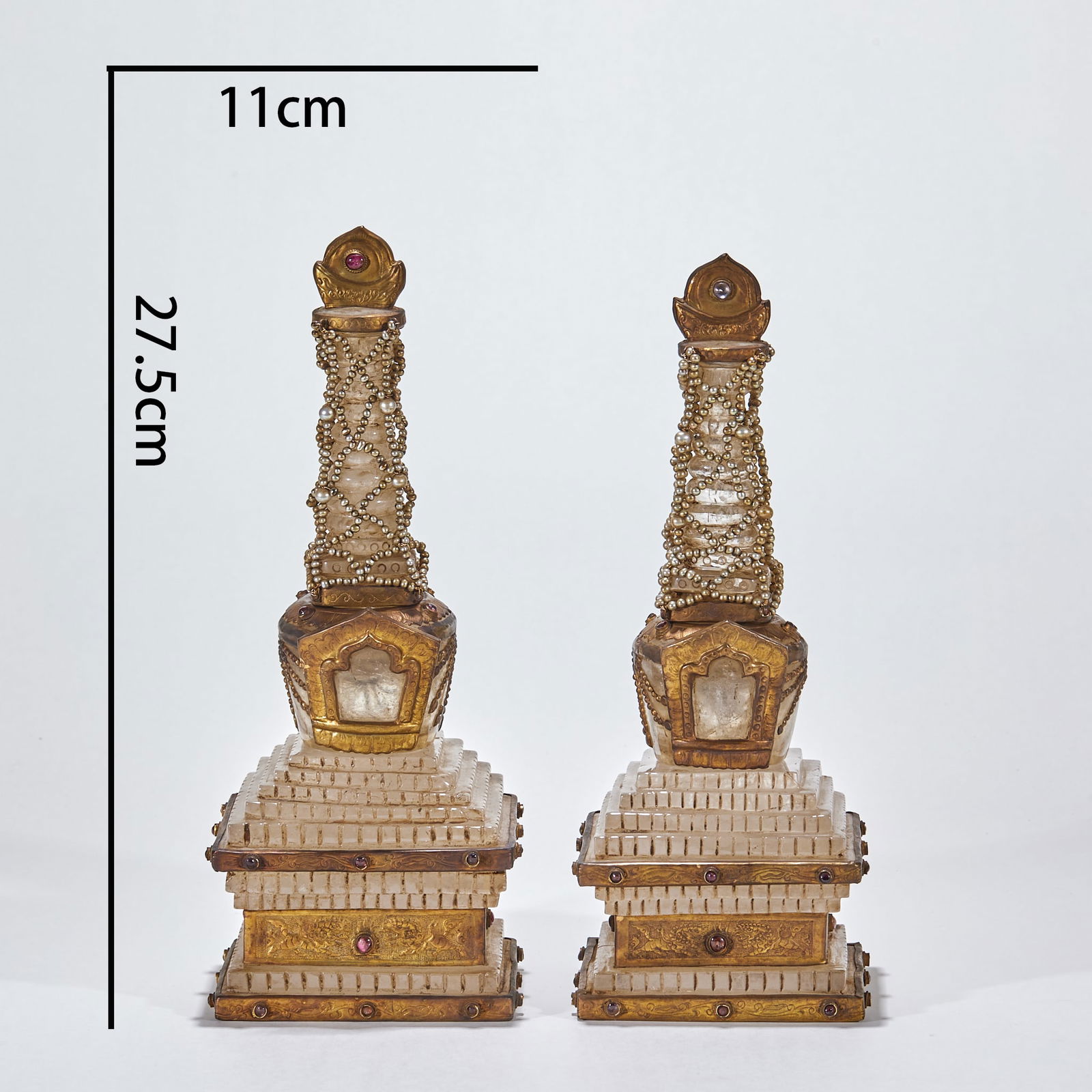 Pair of Liao Dynasty Crystal-Inlaid Pagodas: Pair of Liao Dynasty Crystal Inlaid Pagodas, height 27.5cm, length 11cm, width 11cm. Liao dynasty Buddhist worship object, Tibetan Buddhist stupa-style noble ritual vessel. Main body of natural