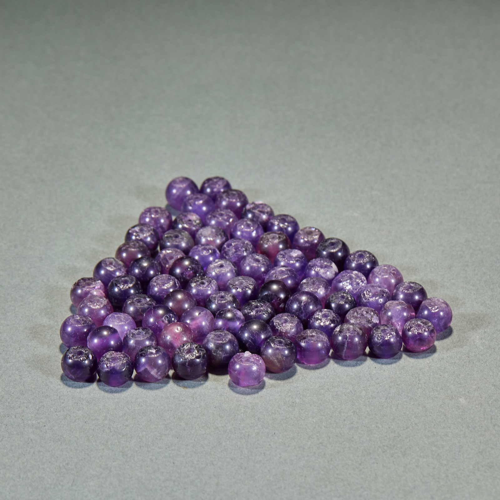 Set of 70 Amethysts: Group of Seventy Amethyst Beads, single bead diameter 1cm. Mostly imported via the ancient Silk Road or locally mined, common in Warring States-Han to Ming-Qing noble tombs as string ornaments, court